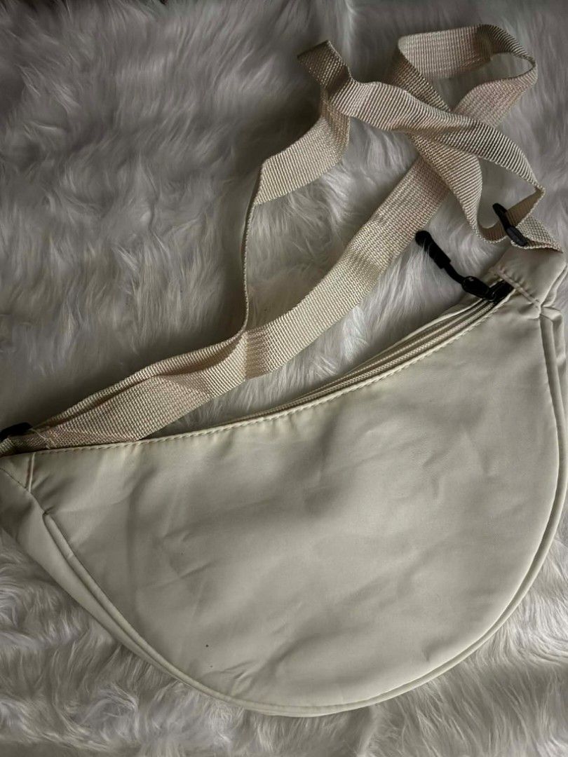 Cream-colored Sling Bag with Adjustable Strap (Category: Cross-body Bags) located in Manila. Submitted by abcdcv (Listing ID 1419115200, Image 1). Description: - Brand new‼️ - Small bag perfect for errands.