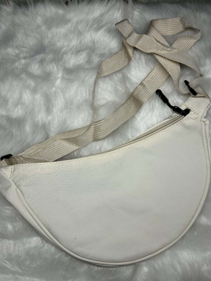 Cream-colored Sling Bag with Adjustable Strap (Category: Cross-body Bags) located in Manila. Submitted by abcdcv (Listing ID 1419115200, Image 3). Description: - Brand new‼️ - Small bag perfect for errands.