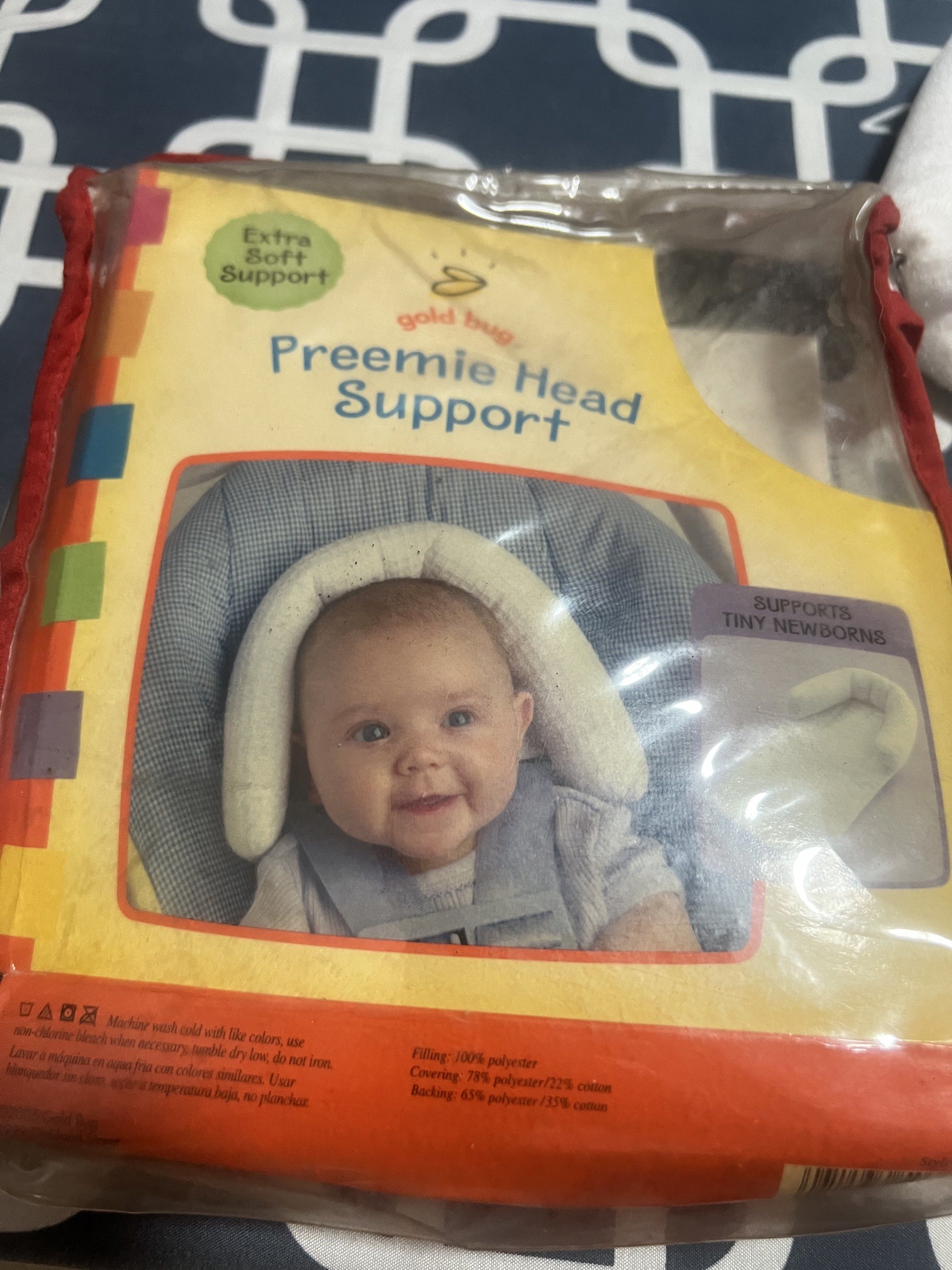 Gold Bug Preemie Head Support (Category: Other Babies Going Out Needs) located in Cainta. Submitted by p3spreloved (Listing ID 1419057749, Image 2). Description: Gold Bug Preemie Head Support for tiny newborns. Provides extra soft support. Machine washable. The covering is 78% polyester and 22% cotton. The backing is 65% polyester and 35% cotton. The filling is 100% polyester. The original price was ₱399.75..