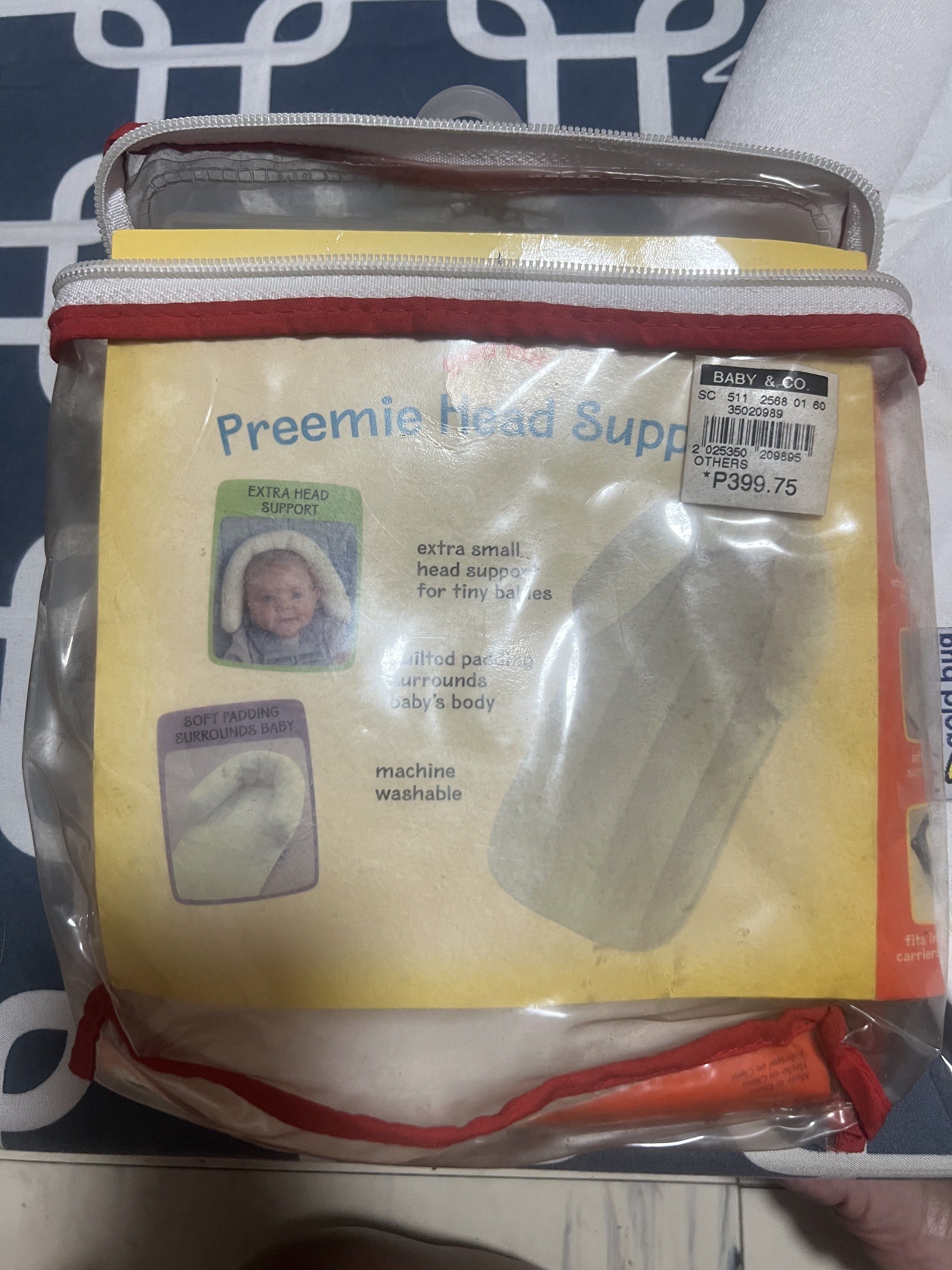 Gold Bug Preemie Head Support (Category: Other Babies Going Out Needs) located in Cainta. Submitted by p3spreloved (Listing ID 1419057749, Image 3). Description: Gold Bug Preemie Head Support for tiny newborns. Provides extra soft support. Machine washable. The covering is 78% polyester and 22% cotton. The backing is 65% polyester and 35% cotton. The filling is 100% polyester. The original price was ₱399.75..