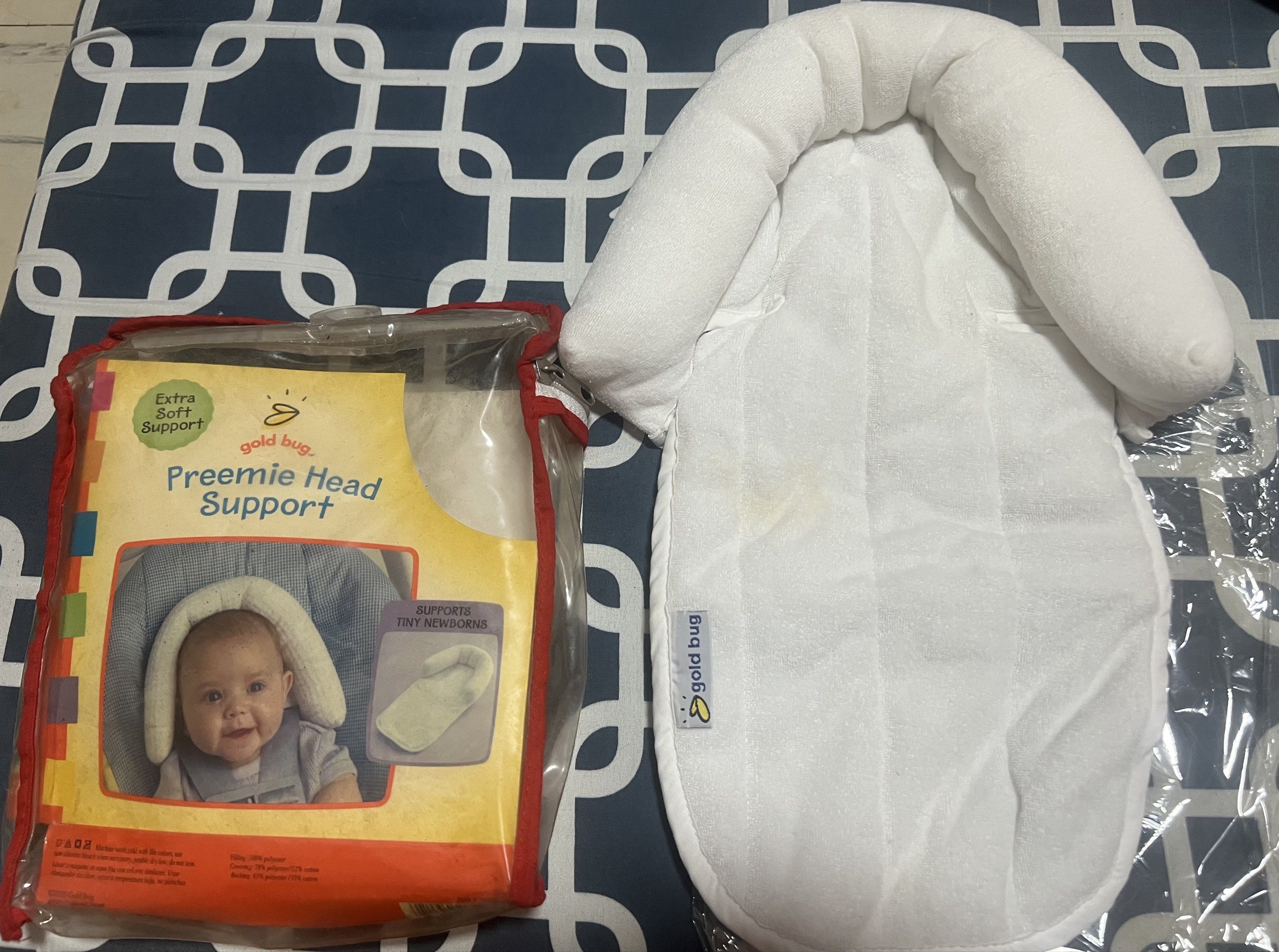 Gold Bug Preemie Head Support (Category: Other Babies Going Out Needs) located in Cainta. Submitted by p3spreloved (Listing ID 1419057749, Image 1). Description: Gold Bug Preemie Head Support for tiny newborns. Provides extra soft support. Machine washable. The covering is 78% polyester and 22% cotton. The backing is 65% polyester and 35% cotton. The filling is 100% polyester. The original price was ₱399.75..