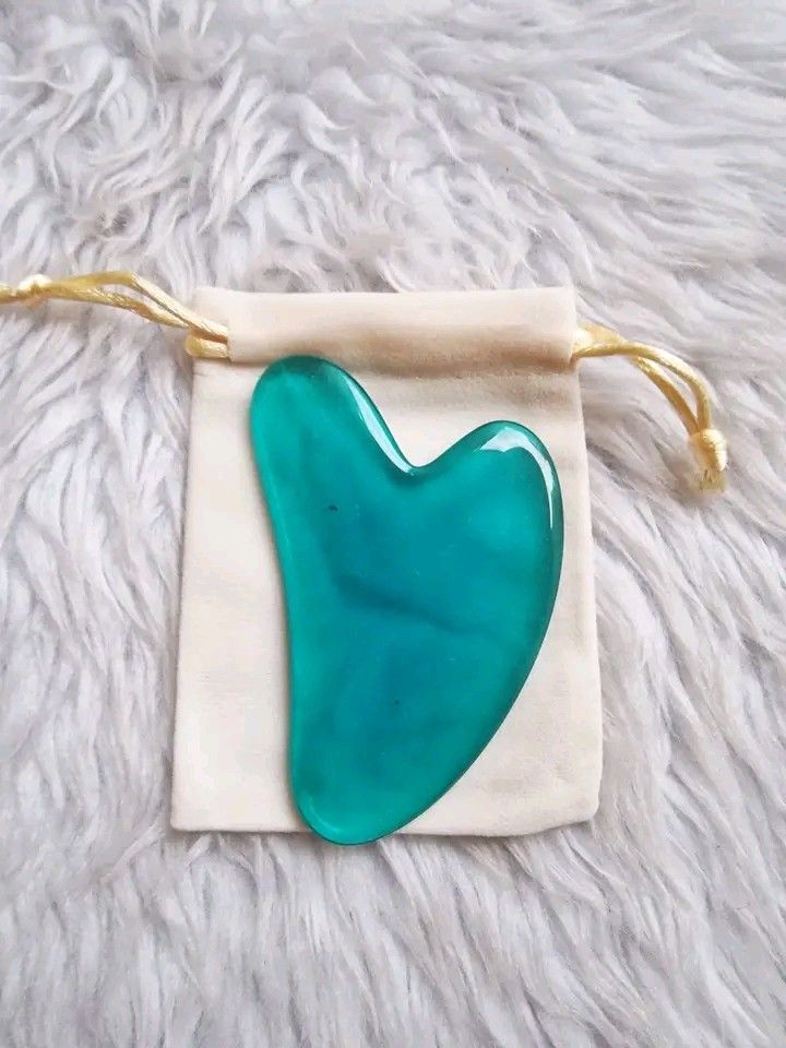 Guasha with pouch (Category: Face Care) located in Quezon City. Submitted by floreskari78555 (Listing ID 1419122259, Image 3). Description: Guasha with pouch✨️ The primary benefit for makeup is texture improvement. Depuffing: Gua Sha encourages lymphatic drainage, which removes excess fluid from the face. This is especially effective for reducing morning puffiness under the eyes, meaning you may need less concealer or color corrector. Softer Fine
