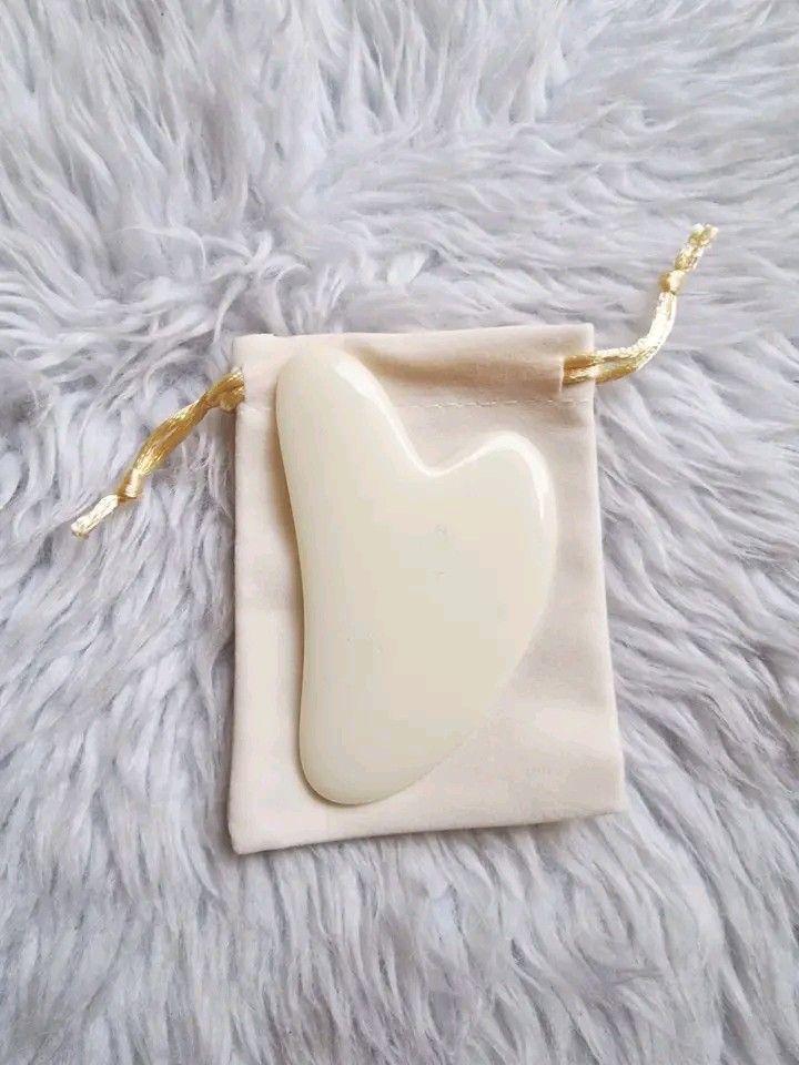 Guasha with pouch (Category: Face Care) located in Quezon City. Submitted by floreskari78555 (Listing ID 1419122259, Image 2). Description: Guasha with pouch✨️ The primary benefit for makeup is texture improvement. Depuffing: Gua Sha encourages lymphatic drainage, which removes excess fluid from the face. This is especially effective for reducing morning puffiness under the eyes, meaning you may need less concealer or color corrector. Softer Fine