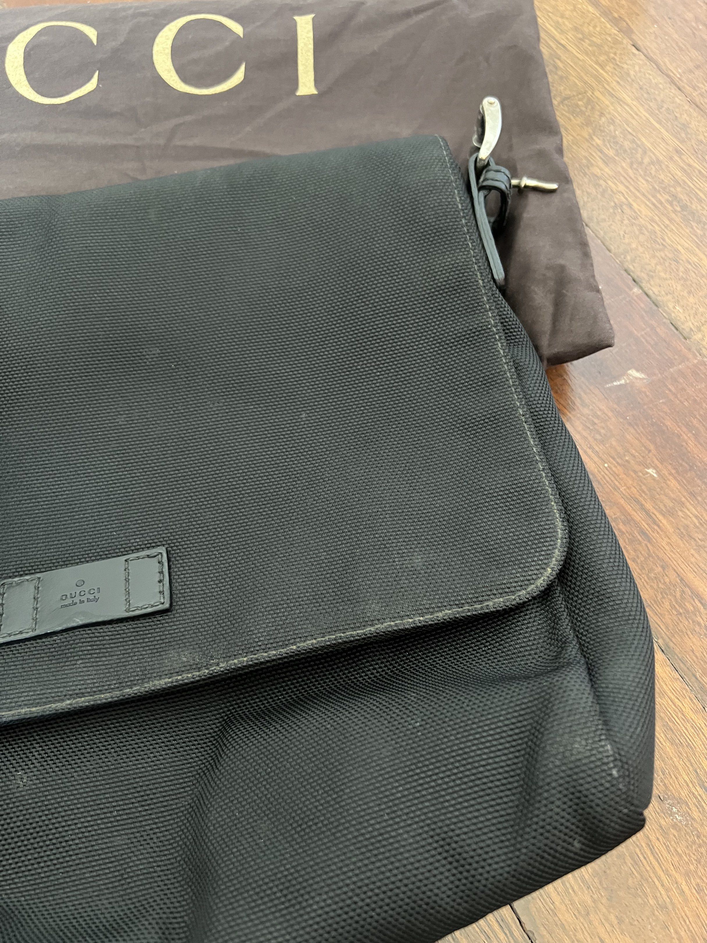 Gucci Canvas Messenger Bag (Category: Sling Bags) located in Quezon City. Submitted by kdiv_ (Listing ID 1419037100, Image 2). Description: Personal preloved |Guaranteed Authentic Bought in Amsterdam Medium in Black Canvas Inclusions: Strap, Receipt, Tag price and Dust Bag ***Only needs cleaning RFS: Decluttering, no longer being used MOP: BDO/GCash Shipping fee to be shouldered by the buyer.