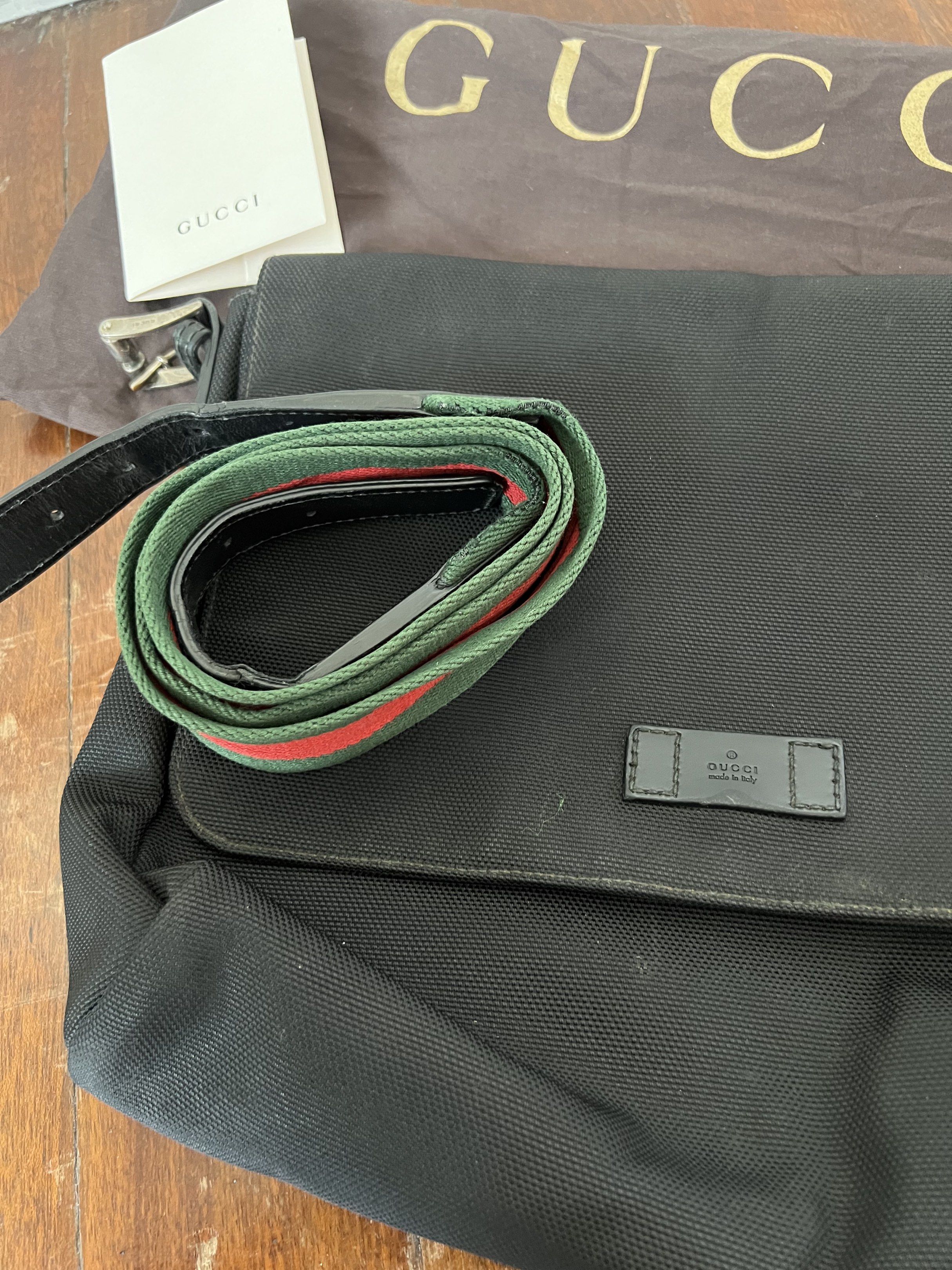 Gucci Canvas Messenger Bag (Category: Sling Bags) located in Quezon City. Submitted by kdiv_ (Listing ID 1419037100, Image 3). Description: Personal preloved |Guaranteed Authentic Bought in Amsterdam Medium in Black Canvas Inclusions: Strap, Receipt, Tag price and Dust Bag ***Only needs cleaning RFS: Decluttering, no longer being used MOP: BDO/GCash Shipping fee to be shouldered by the buyer.