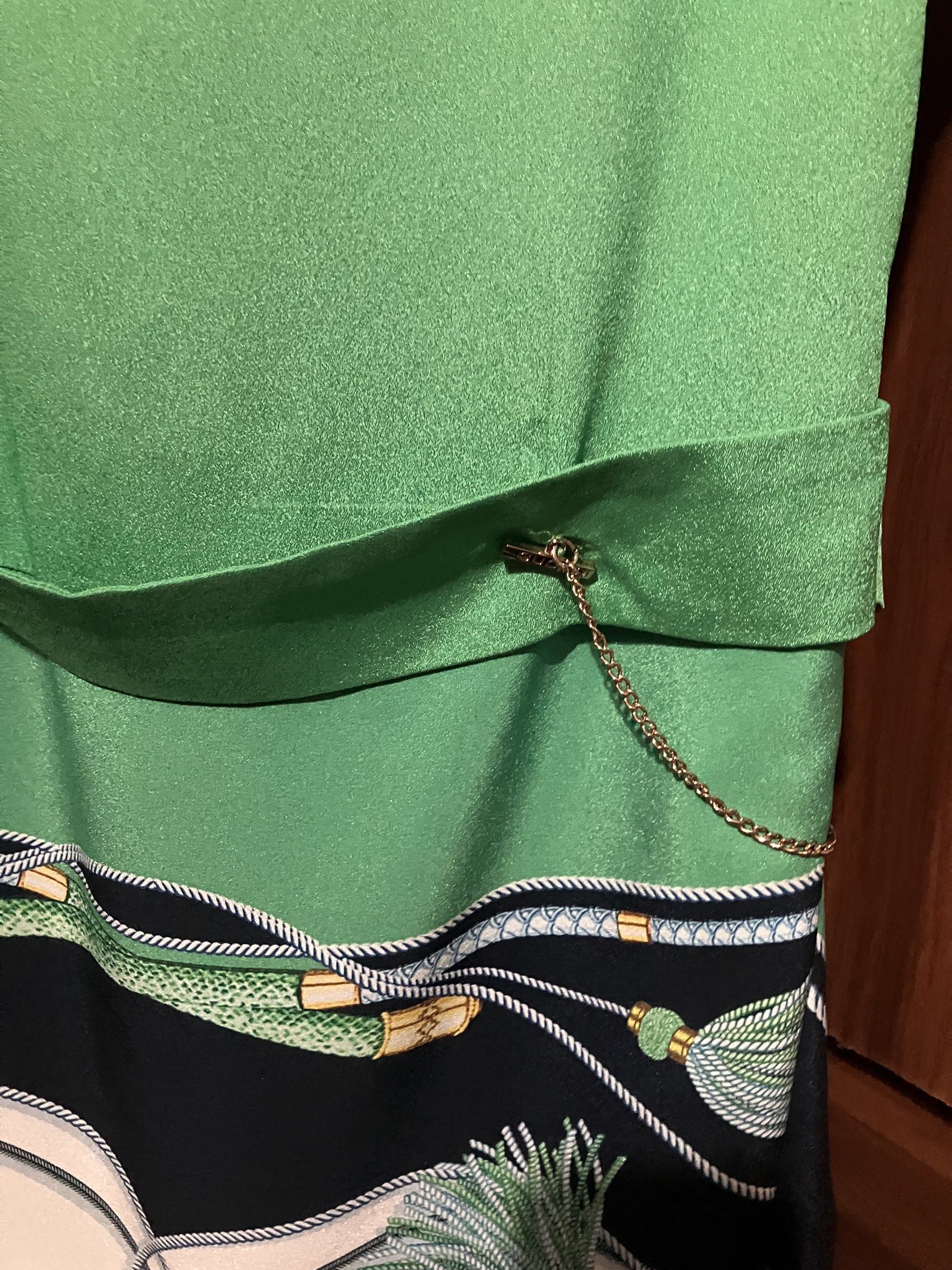 Gucci Green Silk Dress (Category: Luxury Apparel) located in Makati City. Submitted by rubyaltiche (Listing ID 1419014375, Image 2). Description: - Gucci green dress - Size L - Made in Italy - Unique design with patterned skirt - Matching belt detail - Side zipper - Gold chain accent.