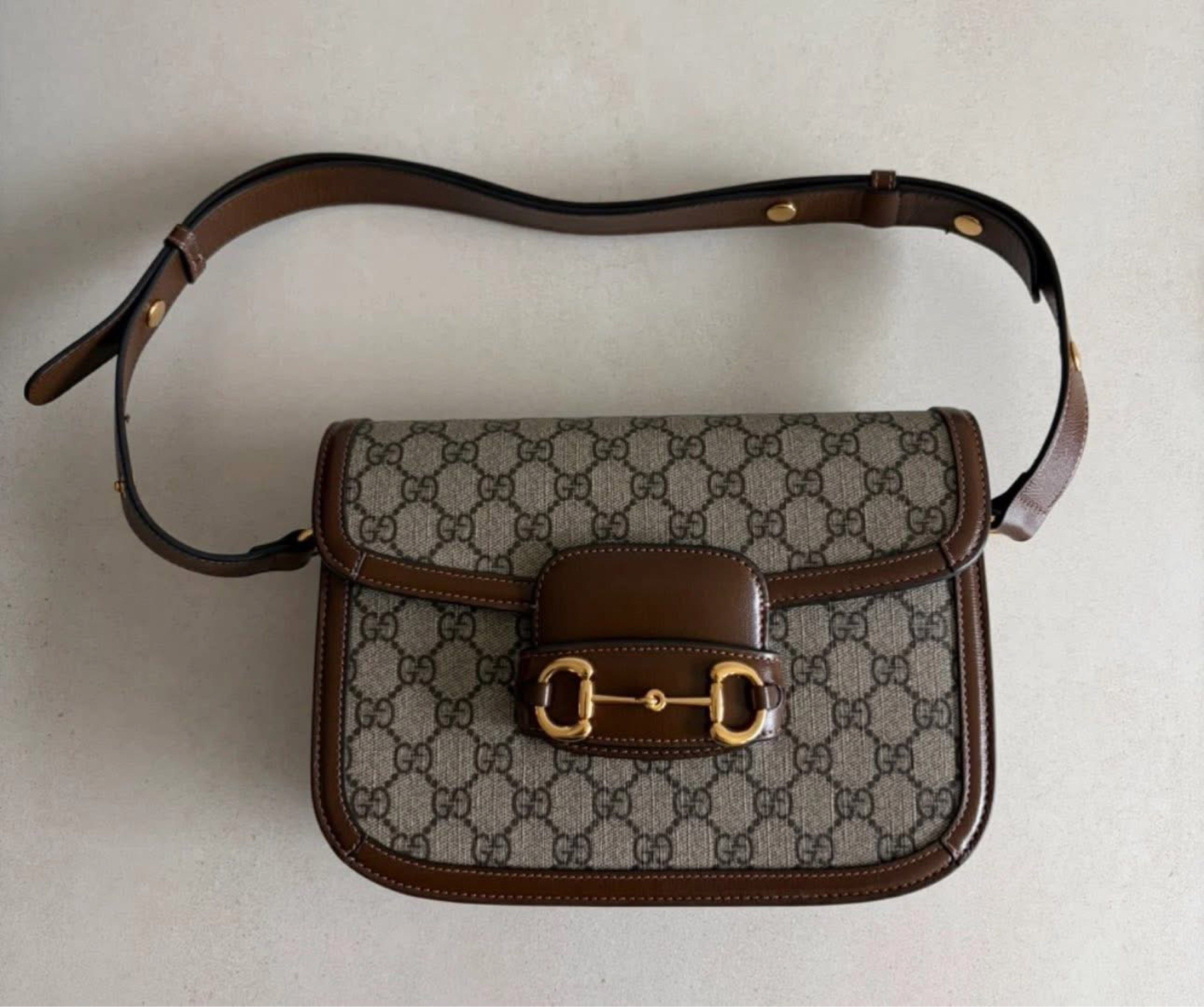 Gucci Horsebit 1955 Shoulder Bag (Category: Luxury Bags & Wallets) located in Quezon City. Submitted by curatedbyamethyst (Listing ID 1419000585, Image 1). Description: - Gucci Horsebit 1955 shoulder bag - GG Supreme canvas with brown leather trim - Gold-toned Horsebit detail - Adjustable shoulder strap - Spacious interior with zippered pocket - Light-colored fabric lining - Classic and elegant design.