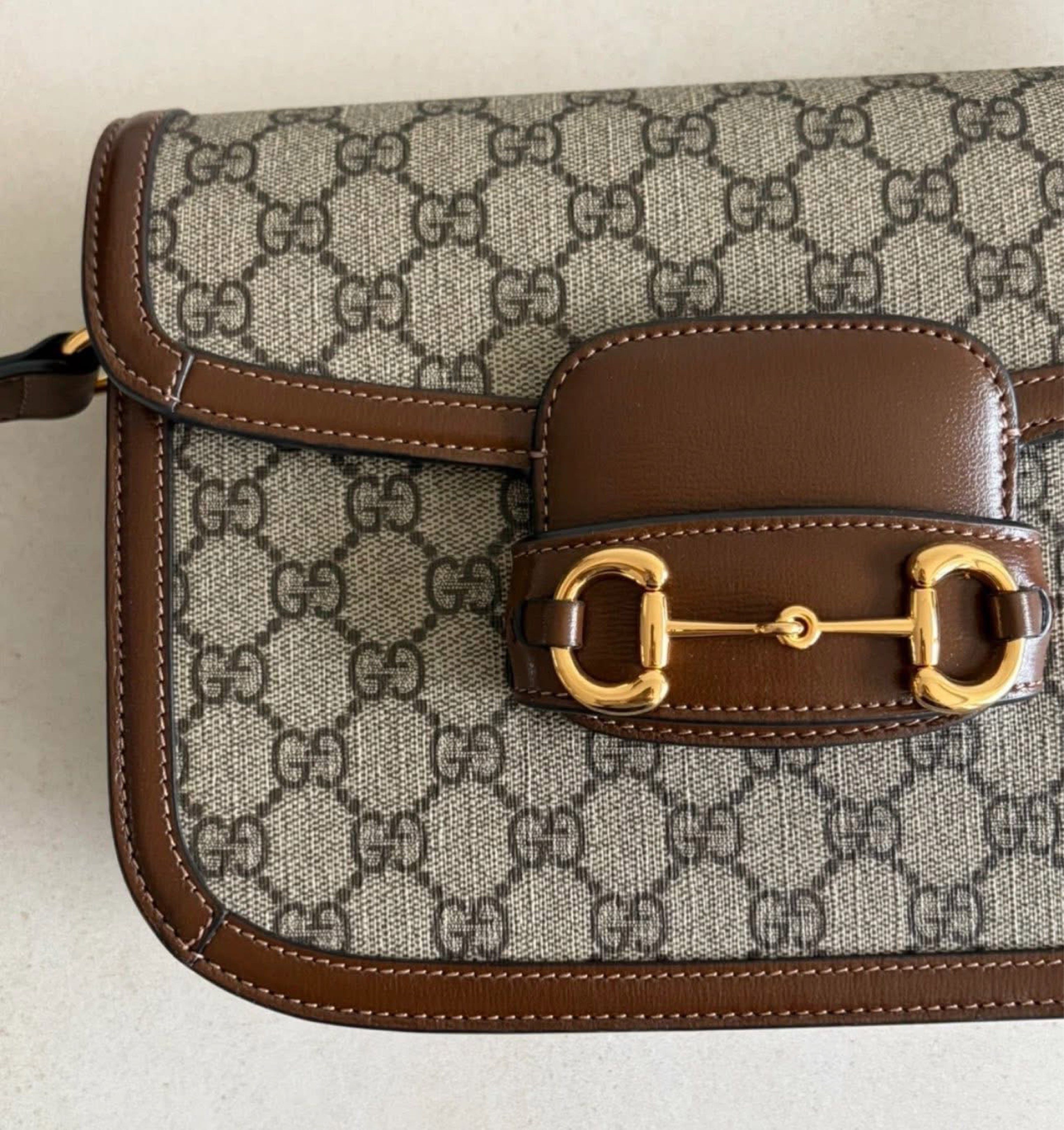 Gucci Horsebit 1955 Shoulder Bag (Category: Luxury Bags & Wallets) located in Quezon City. Submitted by curatedbyamethyst (Listing ID 1419000585, Image 2). Description: - Gucci Horsebit 1955 shoulder bag - GG Supreme canvas with brown leather trim - Gold-toned Horsebit detail - Adjustable shoulder strap - Spacious interior with zippered pocket - Light-colored fabric lining - Classic and elegant design.