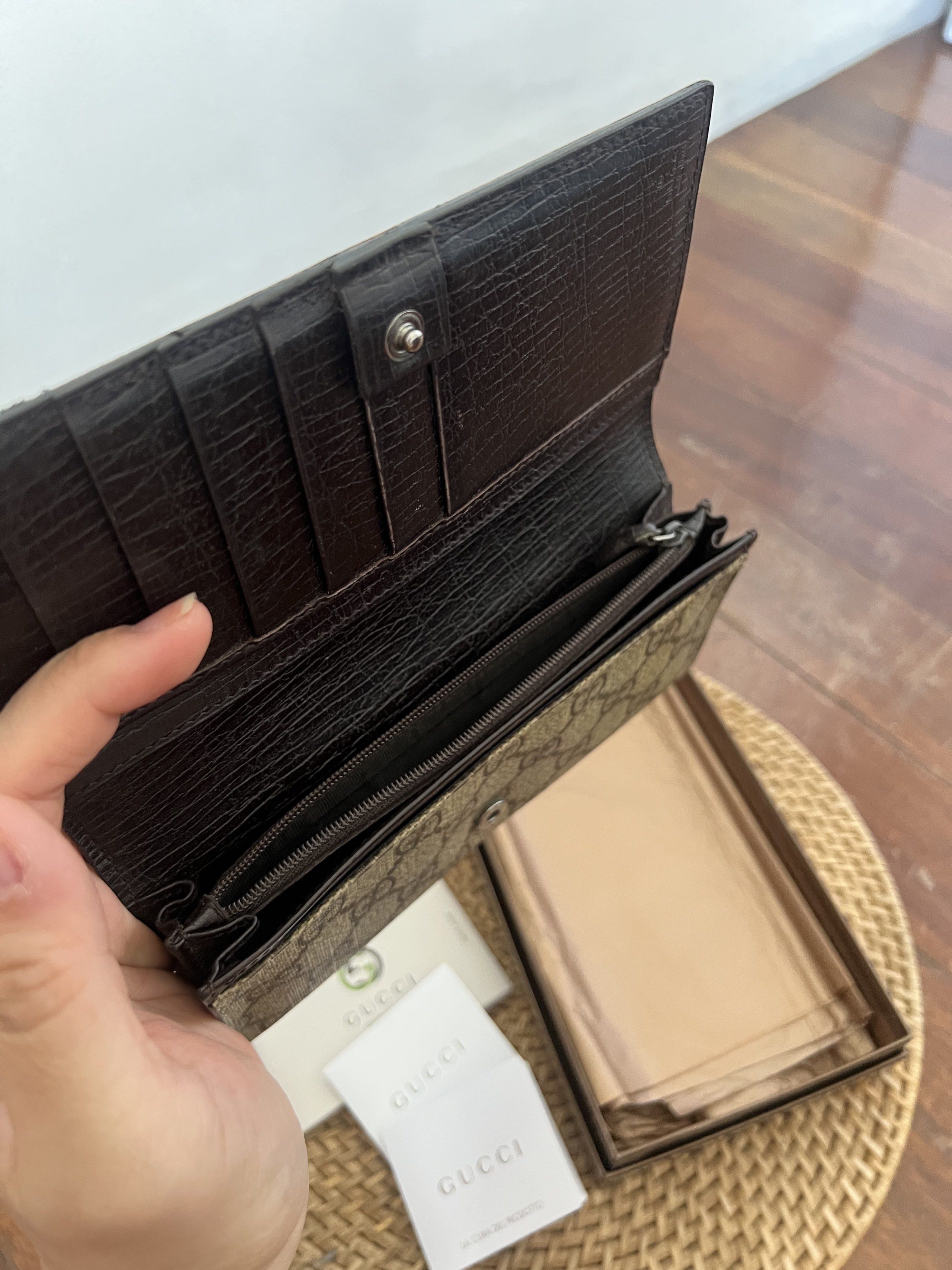 Gucci Monogram Leather Long Wallet (Category: Wallets & Card holders) located in Quezon City. Submitted by kdiv_ (Listing ID 1419099829, Image 3). Description: Personal preloved |Guaranteed Authentic Store Bought Inclusion: Box and Cards RFS: Decluttering, no longer being used MOP: BDO/GCash Shipping fee to be shouldered by the buyer.