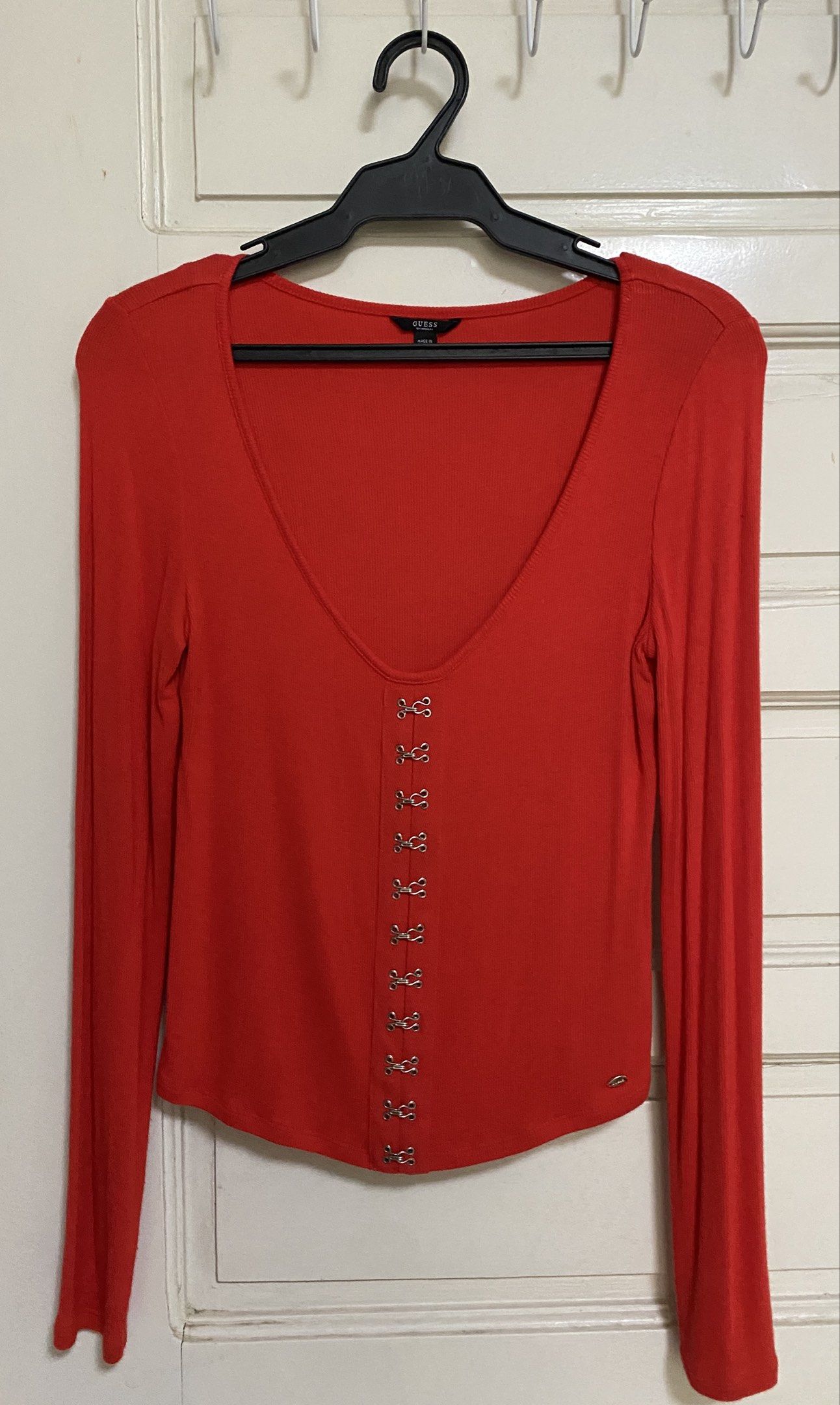 Guess Long Sleeve Top - Red - Size S (Category: Blouses) located in Muntinlupa City. Submitted by greatfindstore (Listing ID 1418977687, Image 1). Description: - Guess long-sleeved top - Scoop neckline - Hook-and-eye closures - Guess logo detail - stretcheable - Size: S - Made in Vietnam.