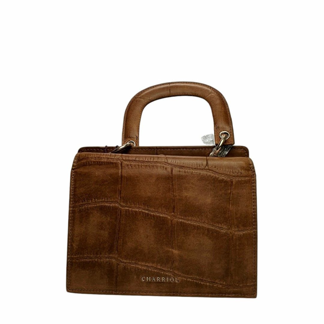 Handbag (Category: Luxury Bags & Wallets) located in Manila. Submitted by cheng23 (Listing ID 1419053443, Image 3). Description: Charriol Bordeaux Bag w/sling Passion bag Small size Brown color With paper bag,dust bag and tag Dimension:17x21.5x9.5 Video available if interested only .