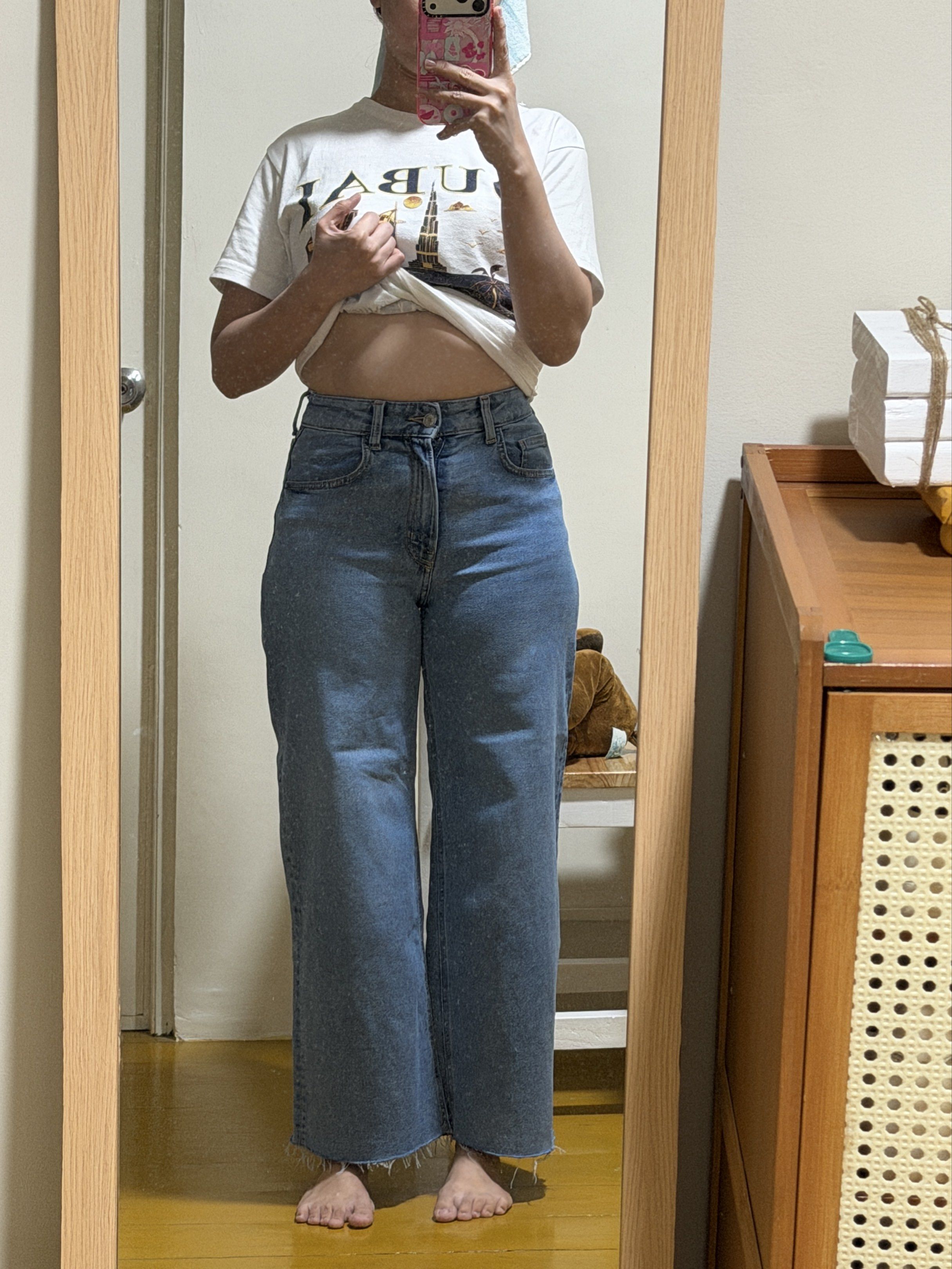 High-Waisted Wide Leg Jeans (Category: Jeans) located in Las Pinas. Submitted by __dayaaaaan21 (Listing ID 1419144287, Image 3). Description: - Light wash denim jeans - High-waisted, wide-leg cut - Classic five-pocket design - Button and zipper closure - Raw, unfinished hem - Medium wash denim - Ideal for casual outfits 27 Waistline.