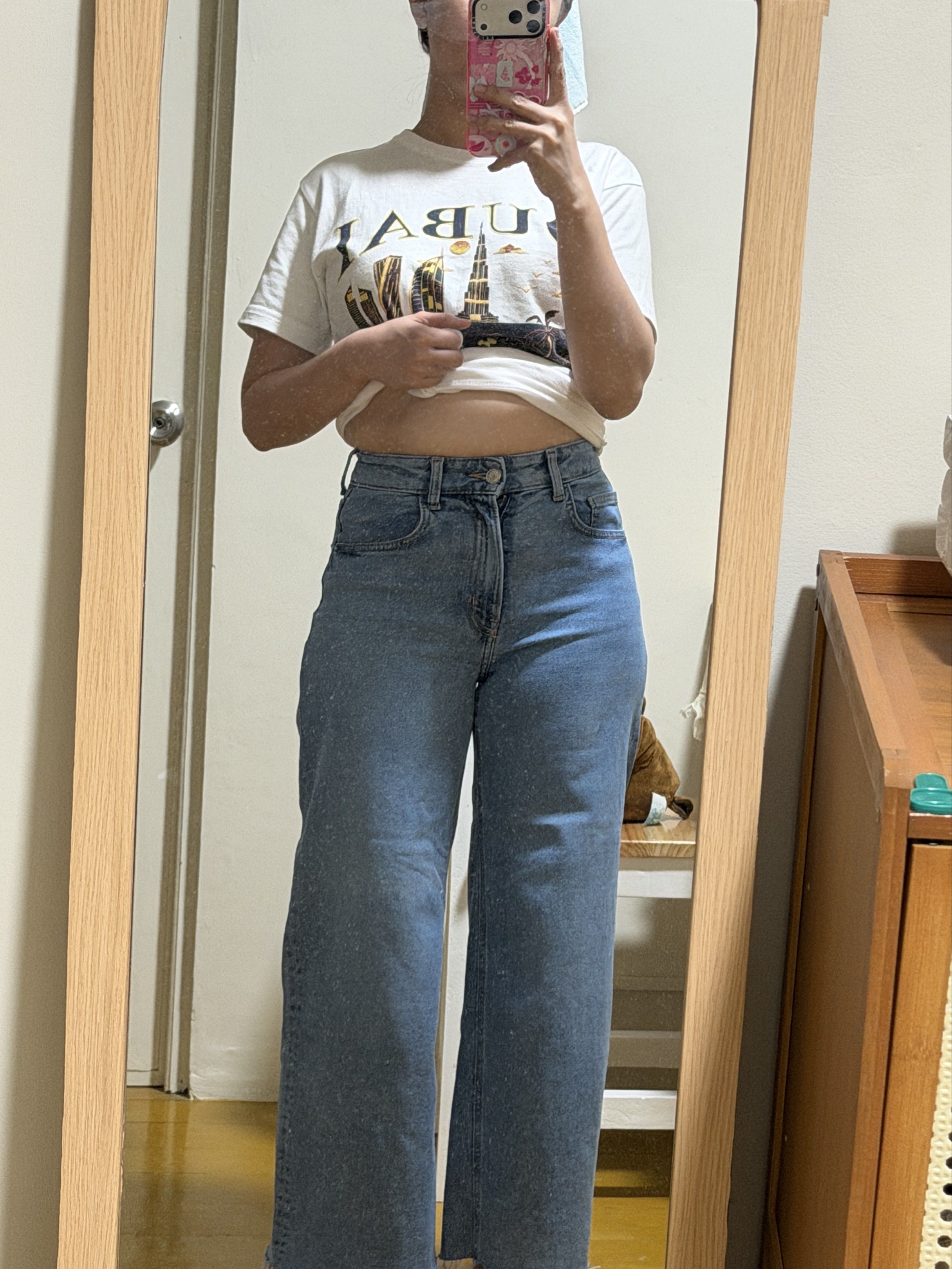 High-Waisted Wide Leg Jeans (Category: Jeans) located in Las Pinas. Submitted by __dayaaaaan21 (Listing ID 1419144287, Image 1). Description: - Light wash denim jeans - High-waisted, wide-leg cut - Classic five-pocket design - Button and zipper closure - Raw, unfinished hem - Medium wash denim - Ideal for casual outfits 27 Waistline.