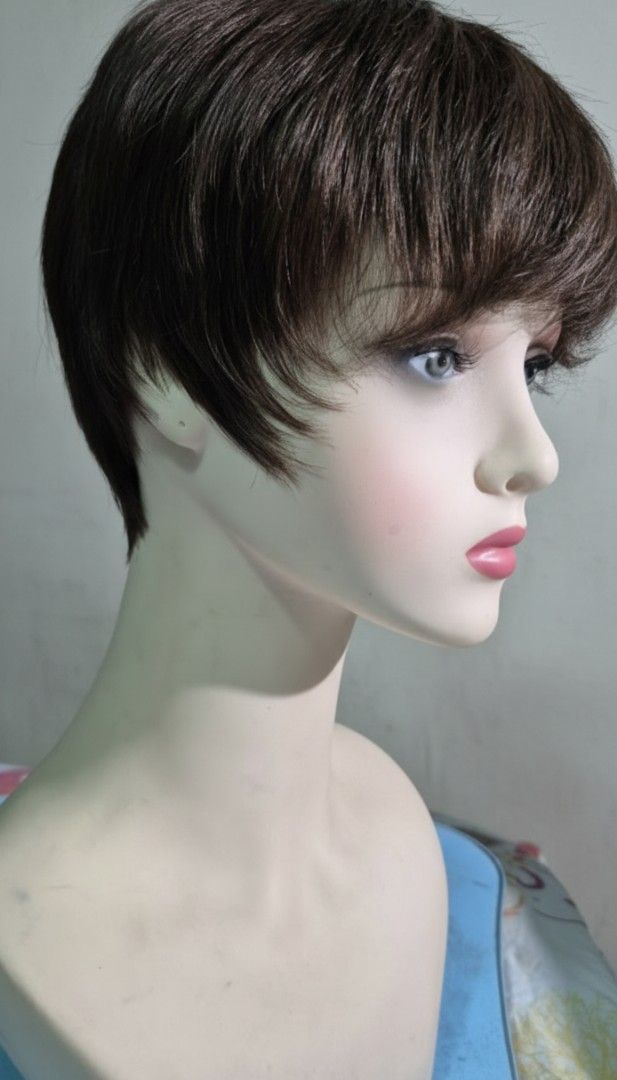 Human Hair Short Brown Wig (Category: Hair Accessories) located in Navotas City. Submitted by jaycustodio2 (Listing ID 1419017656, Image 2). Description: - Short, layered wig - Natural brown color - Side-swept fringe - Comfortable fit - Styled and ready to wear - Perfect for cosplay or a quick style change.