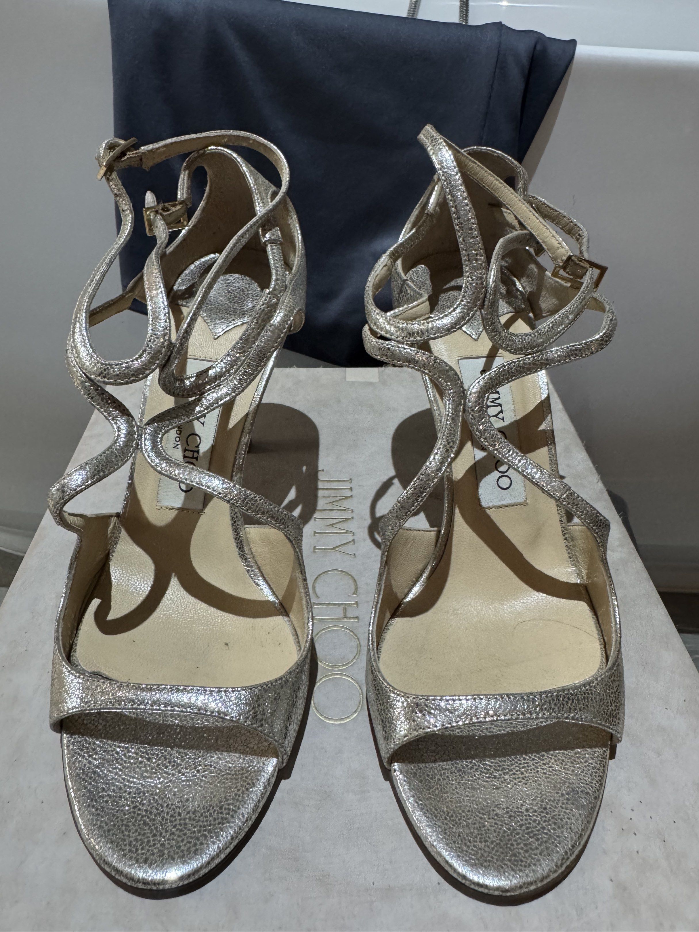 Jimmy Choo Silver Strappy Heels (Category: Heels) located in Quezon City. Submitted by tinylee60 (Listing ID 1419140145, Image 2). Description: - Jimmy Choo silver strappy heels Size 6.5 - Delicate design with multiple straps - Stiletto heel - Metallic finish - Buckle closure - Jimmy Choo logo on insole - Comes with original box Original price 60K.