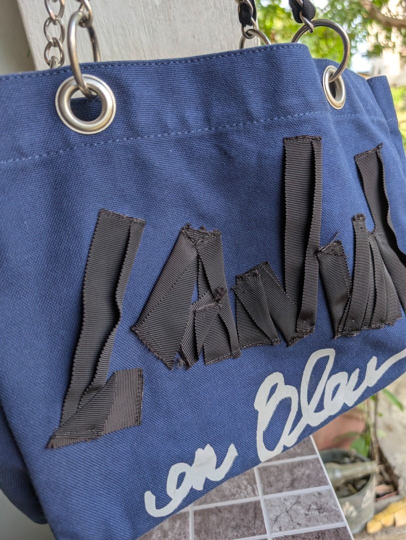 Lanvin Blu Canvas Tote bag Chain Strap Large (Category: Luxury Bags & Wallets) located in San Carlos. Submitted by khaisser07 (Listing ID 1419189743, Image 2). Description: Auth lanvin blue tote Canvas Mint condition, inside pocket Price 380o shipped.