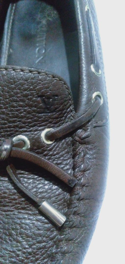 Louis Vuitton Brown Leather Loafers (Category: Casual Shoes) located in Naga. Submitted by pec3c (Listing ID 1419089326, Image 2). Description: - Authentic Louis Vuitton - Brown leather - Classic loafer design - Textured leather upper - Louis Vuitton logo and "Made in Italy" on insole - Decorative laces with metal accents - Stylish and comfortable.