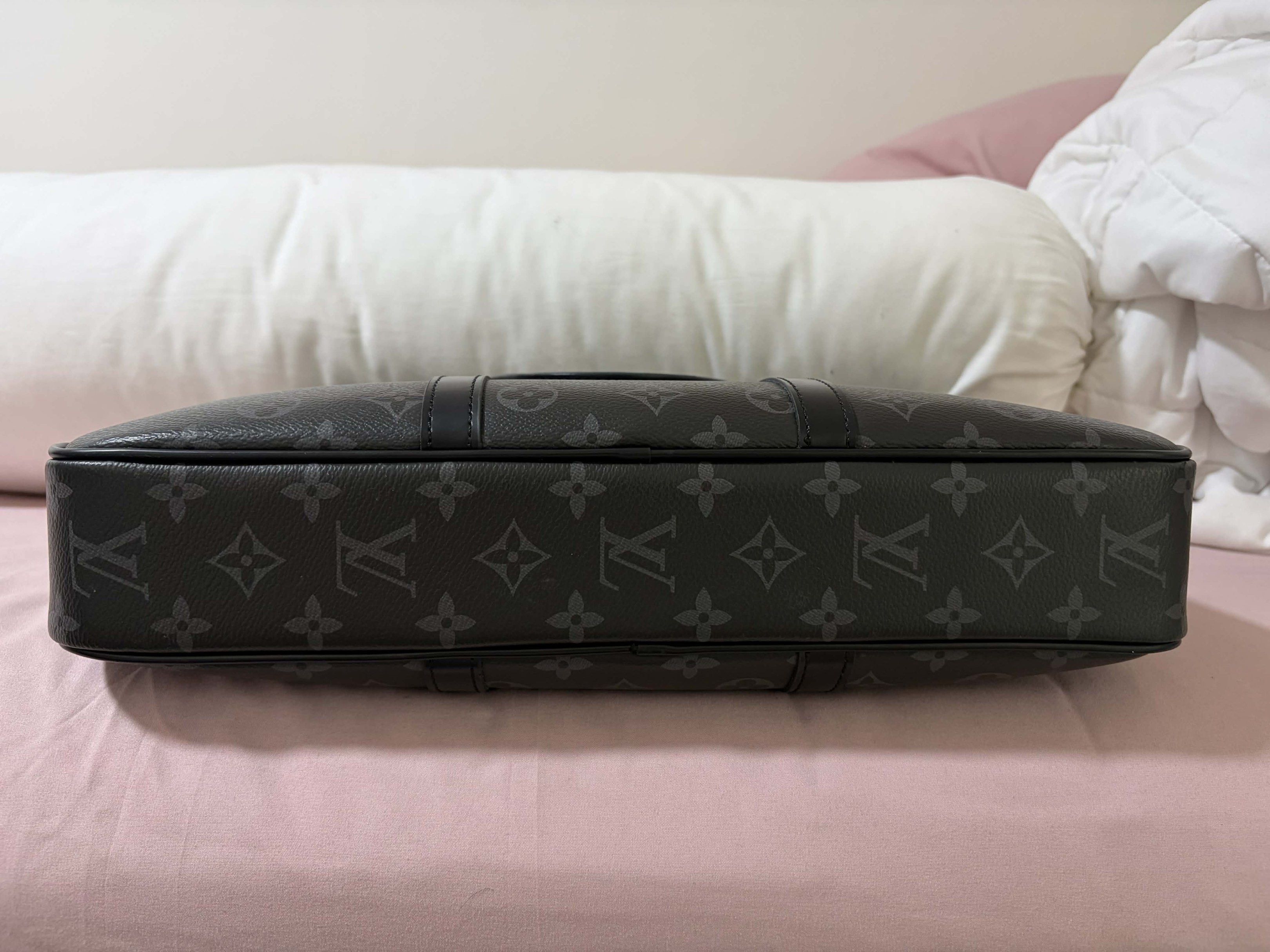 Louis Vuitton Monogram Eclipse Briefcase (Category: Luxury Bags & Wallets) located in Muntinlupa City. Submitted by el1b12345 (Listing ID 1419109988, Image 2). Description: - Louis Vuitton Porte Documents Voyage Brief Case - no issues - Stylish dark grey color - Features the iconic LV monogram pattern - Secure zip closure - Comfortable top handle - Ideal for professional use - High quality replica/Looks authentic and barely noticeable - mop: Gcas