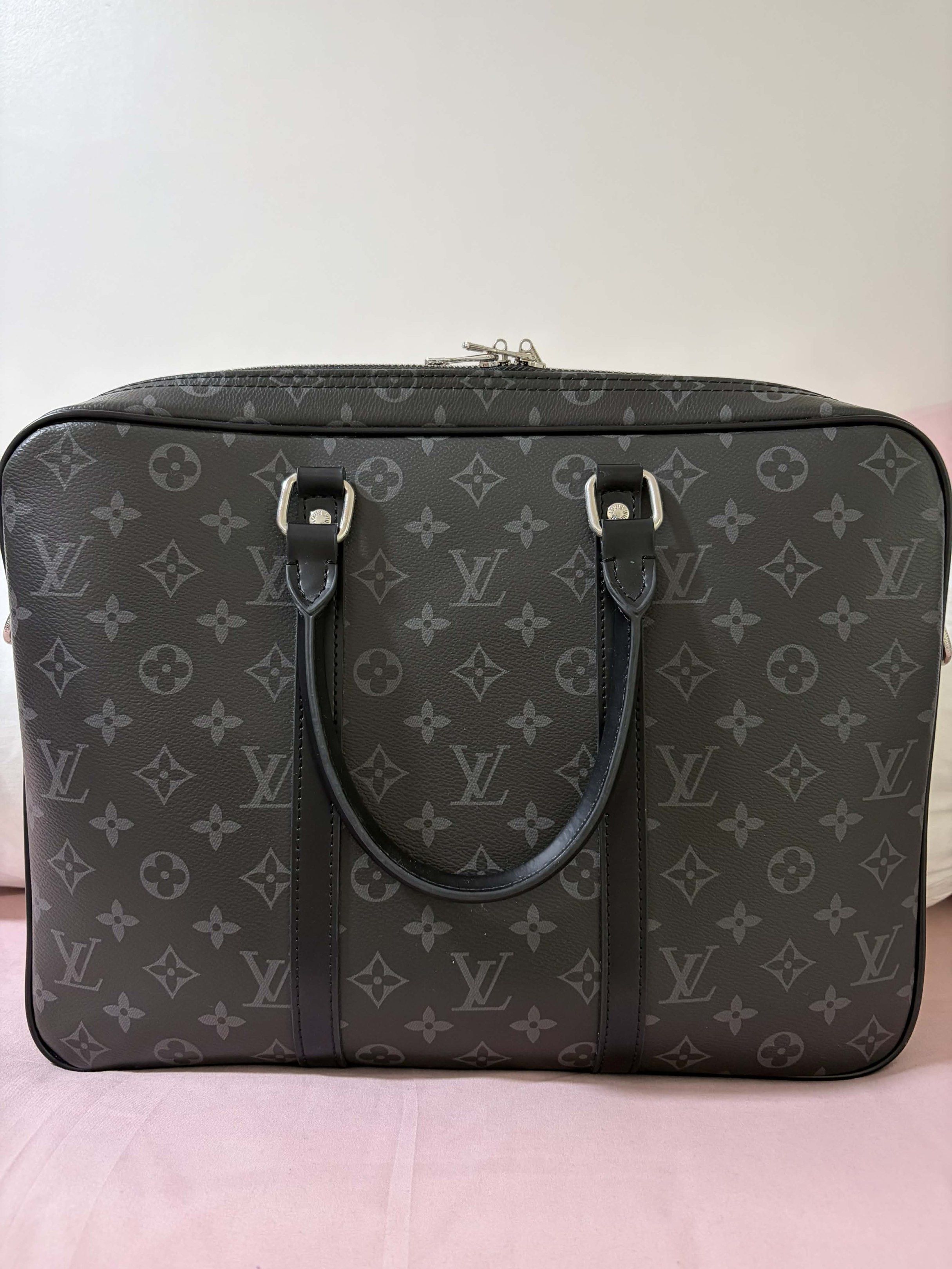 Louis Vuitton Monogram Eclipse Briefcase (Category: Luxury Bags & Wallets) located in Muntinlupa City. Submitted by el1b12345 (Listing ID 1419109988, Image 3). Description: - Louis Vuitton Porte Documents Voyage Brief Case - no issues - Stylish dark grey color - Features the iconic LV monogram pattern - Secure zip closure - Comfortable top handle - Ideal for professional use - High quality replica/Looks authentic and barely noticeable - mop: Gcas