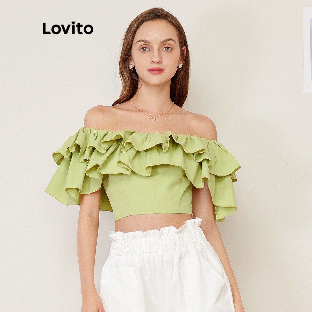 Lovito Off-Shoulder Ruffle Crop Top large (Category: Others Tops) located in Paranaque City. Submitted by bailey_cade (Listing ID 1419145050, Image 1). Description: - Lovito off-shoulder crop top - Vibrant green color - Flattering ruffle design - Cropped length - Side zipper closure - Off-shoulder neckline - Short sleeves - Suitable for casual and semi-formal occasions New with tag Please request for actual photo RFS: doesn’t fit me.