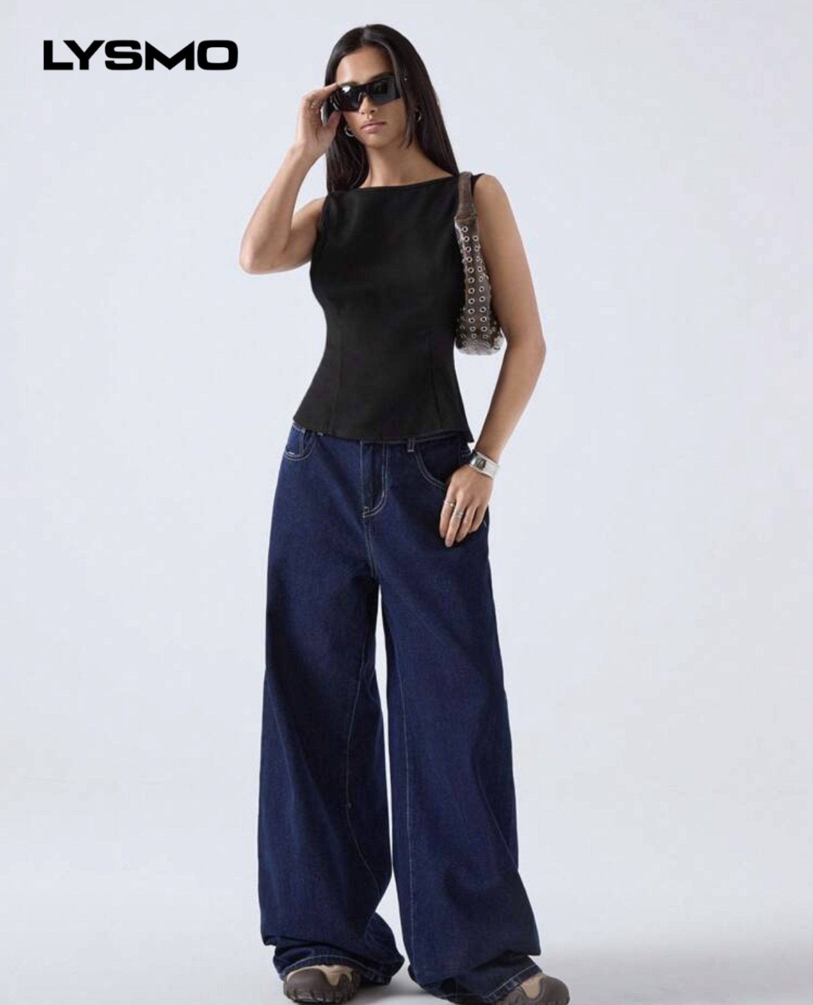 LYSMO Black Sleeveless Top (Category: Sleeveless) located in Manila. Submitted by _everythinguwant__ (Listing ID 1419145981, Image 3). Description: - Brand: LYSMO - Style: Sleeveless top - Color: Black - Neckline: Square - Fit: Fitted - Closure: Back zipper - Features: Versatile, can be dressed up or down. - Perfect for a chic, modern look..