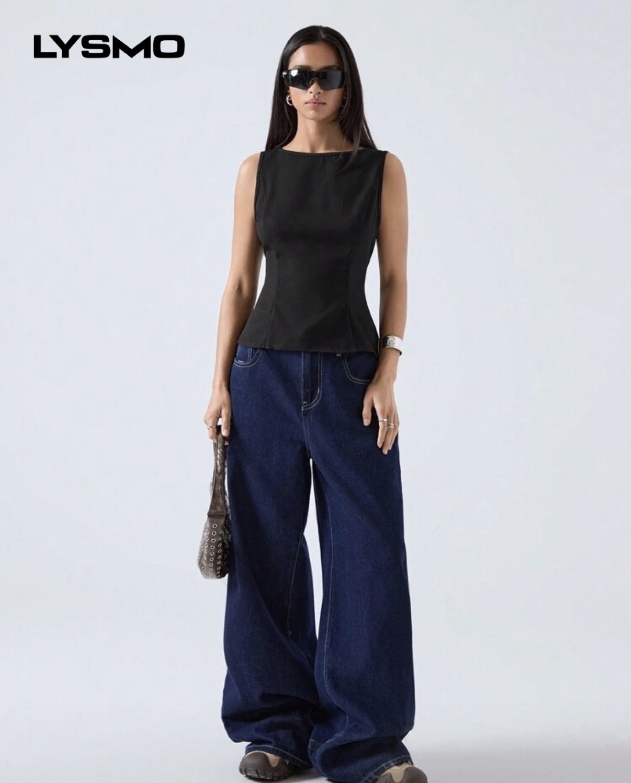 LYSMO Black Sleeveless Top (Category: Sleeveless) located in Manila. Submitted by _everythinguwant__ (Listing ID 1419145981, Image 1). Description: - Brand: LYSMO - Style: Sleeveless top - Color: Black - Neckline: Square - Fit: Fitted - Closure: Back zipper - Features: Versatile, can be dressed up or down. - Perfect for a chic, modern look..
