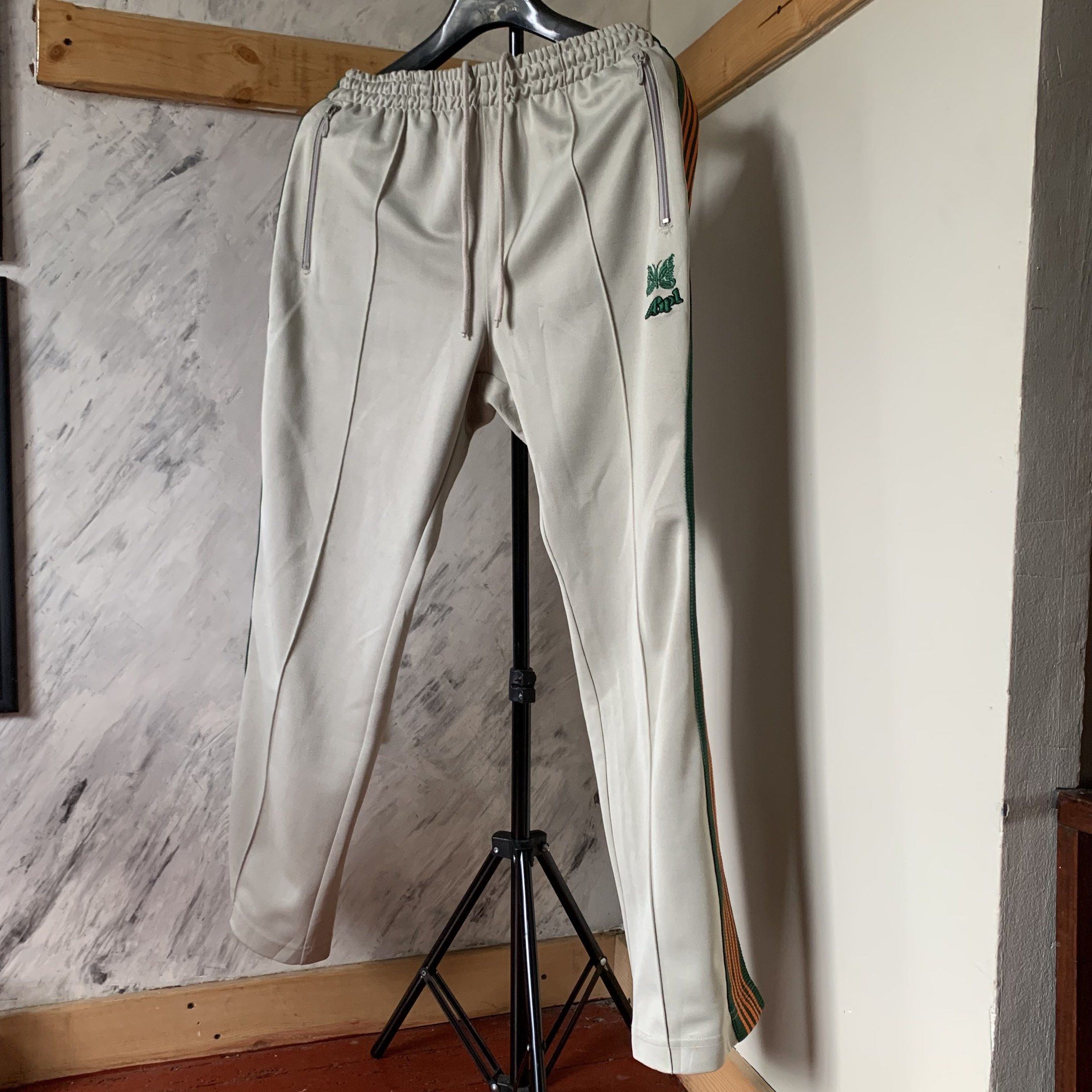 Needles x AIPL track pants (Category: Joggers) located in Baguio. Submitted by chronicles_cache (Listing ID 1419006051, Image 2). Description: waistline 16.5 thigh 11.5 length 48 leg opening 9.5 Size tagged: M.