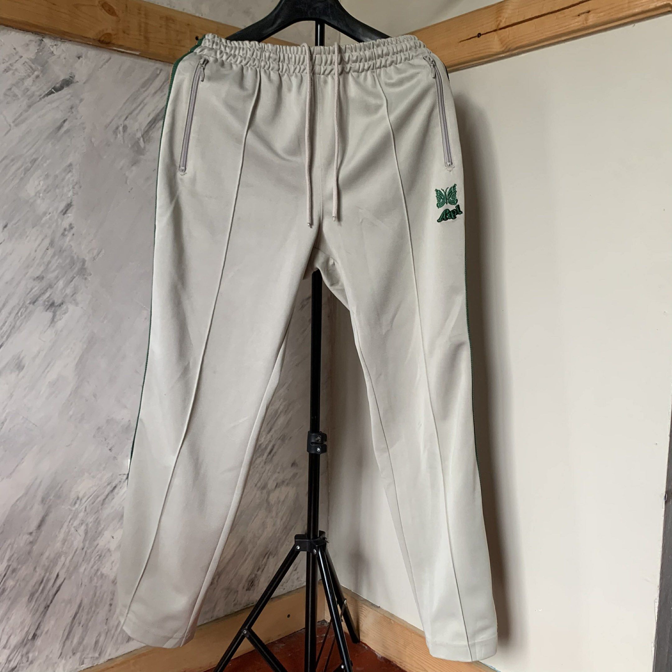 Needles x AIPL track pants (Category: Joggers) located in Baguio. Submitted by themgarbage (Listing ID 1419077896, Image 2). Description: waistline 33 thigh 11.5 length 48 leg opening 9.5 Size tagged: M.