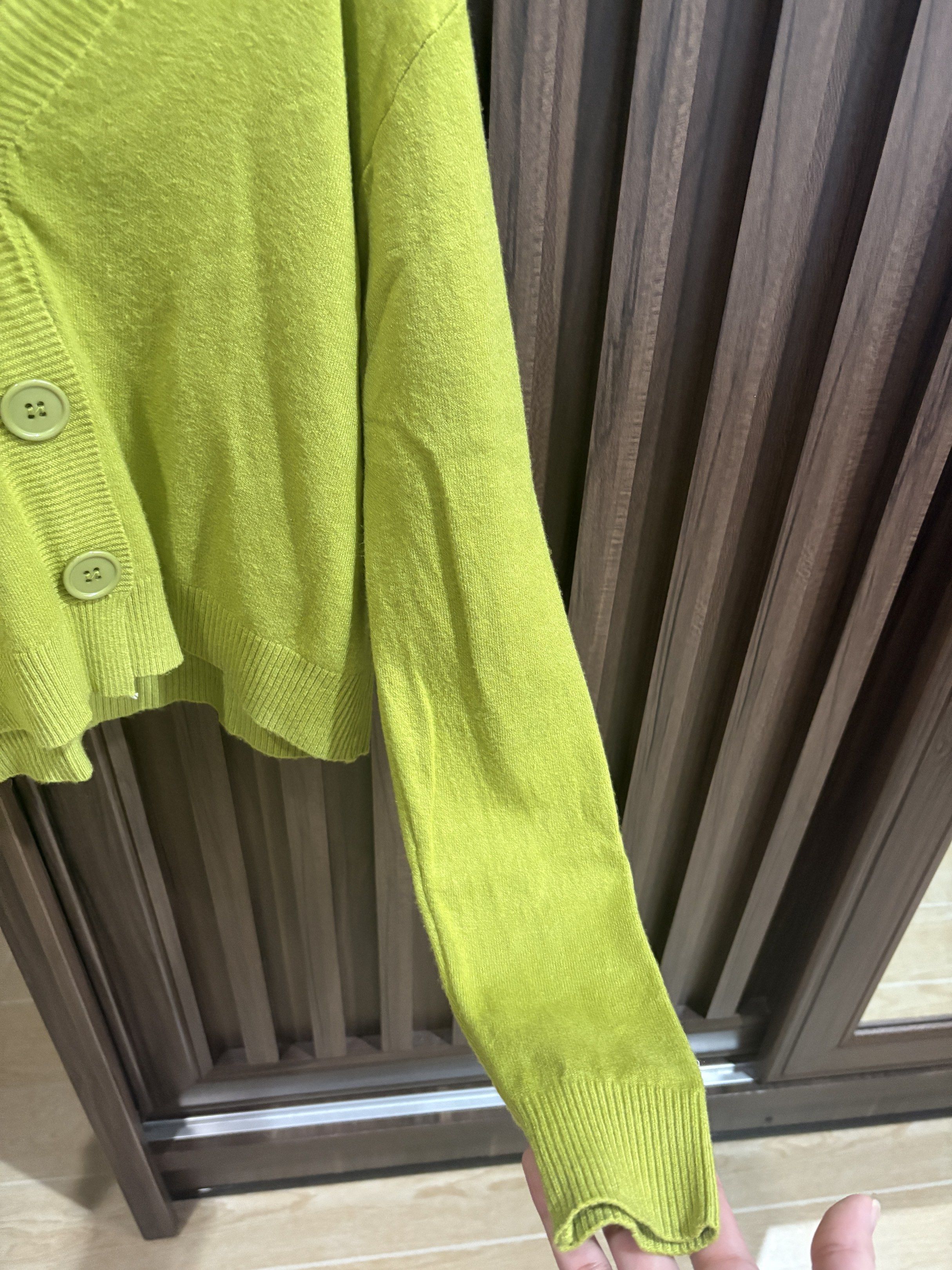 Olive Green Cardigan (Category: Coats, Jackets and Outerwear) located in Manila. Submitted by dkarchives (Listing ID 1419087603, Image 3). Description: Olive Green Cardigan - knit material - soft and thin fabric - doesn’t have a brand! - bought during the pandemic.