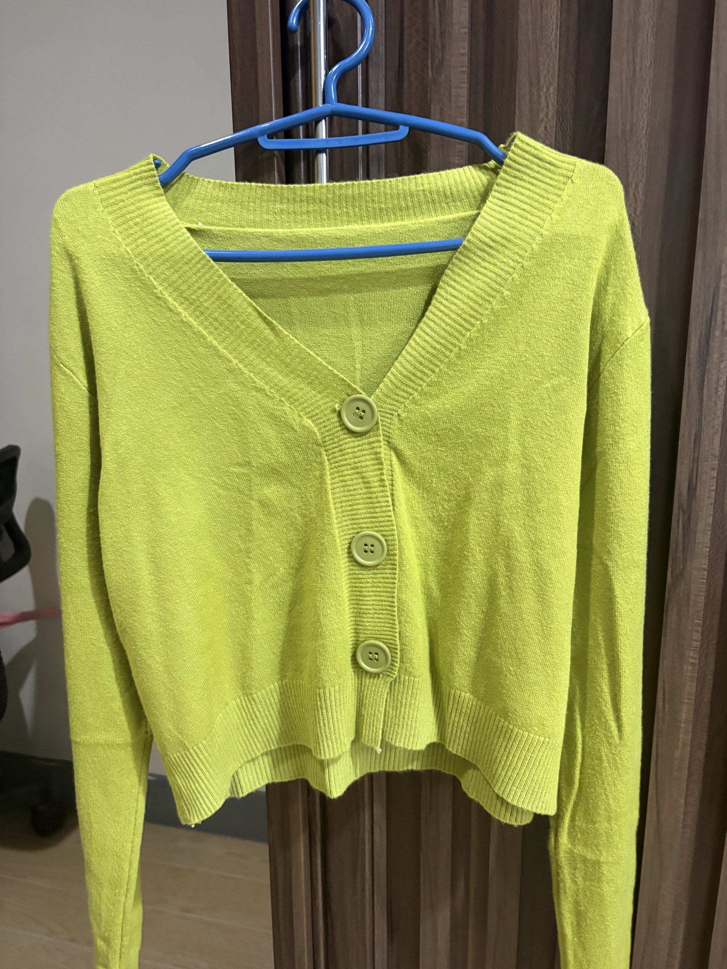 Olive Green Cardigan (Category: Coats, Jackets and Outerwear) located in Manila. Submitted by dkarchives (Listing ID 1419087603, Image 1). Description: Olive Green Cardigan - knit material - soft and thin fabric - doesn’t have a brand! - bought during the pandemic.