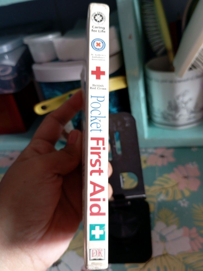 Pocket First Aid Book (Category: Textbooks) located in Quezon City. Submitted by an.marie (Listing ID 1418996644, Image 2). Description: Pocket First Aid book. Features first aid information for emergencies. Published by DK in 2010. Includes illustrations and instructions. Complete pages.
