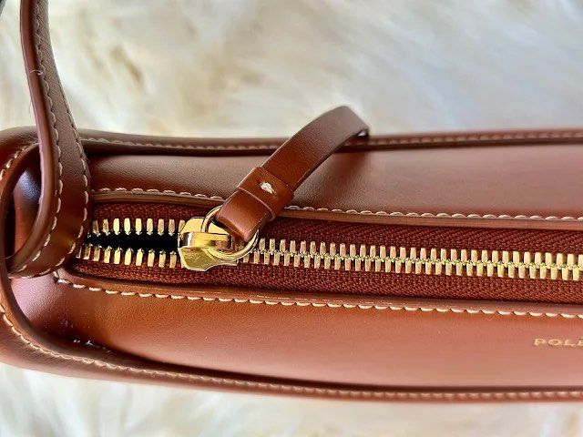 Polène numero dix in cognac color (Category: Shoulder Bags) located in Manila. Submitted by pursonalshopper (Listing ID 1419187947, Image 3). Description: No issue No damage Comes with extra sling strap, dustbag and paperbag Color cognac .