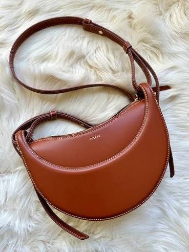 Polène numero dix in cognac color (Category: Shoulder Bags) located in Manila. Submitted by pursonalshopper (Listing ID 1419187947, Image 1). Description: No issue No damage Comes with extra sling strap, dustbag and paperbag Color cognac .
