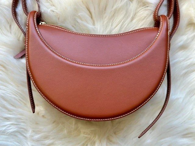 Polène numero dix in cognac color (Category: Shoulder Bags) located in Manila. Submitted by pursonalshopper (Listing ID 1419187947, Image 2). Description: No issue No damage Comes with extra sling strap, dustbag and paperbag Color cognac .