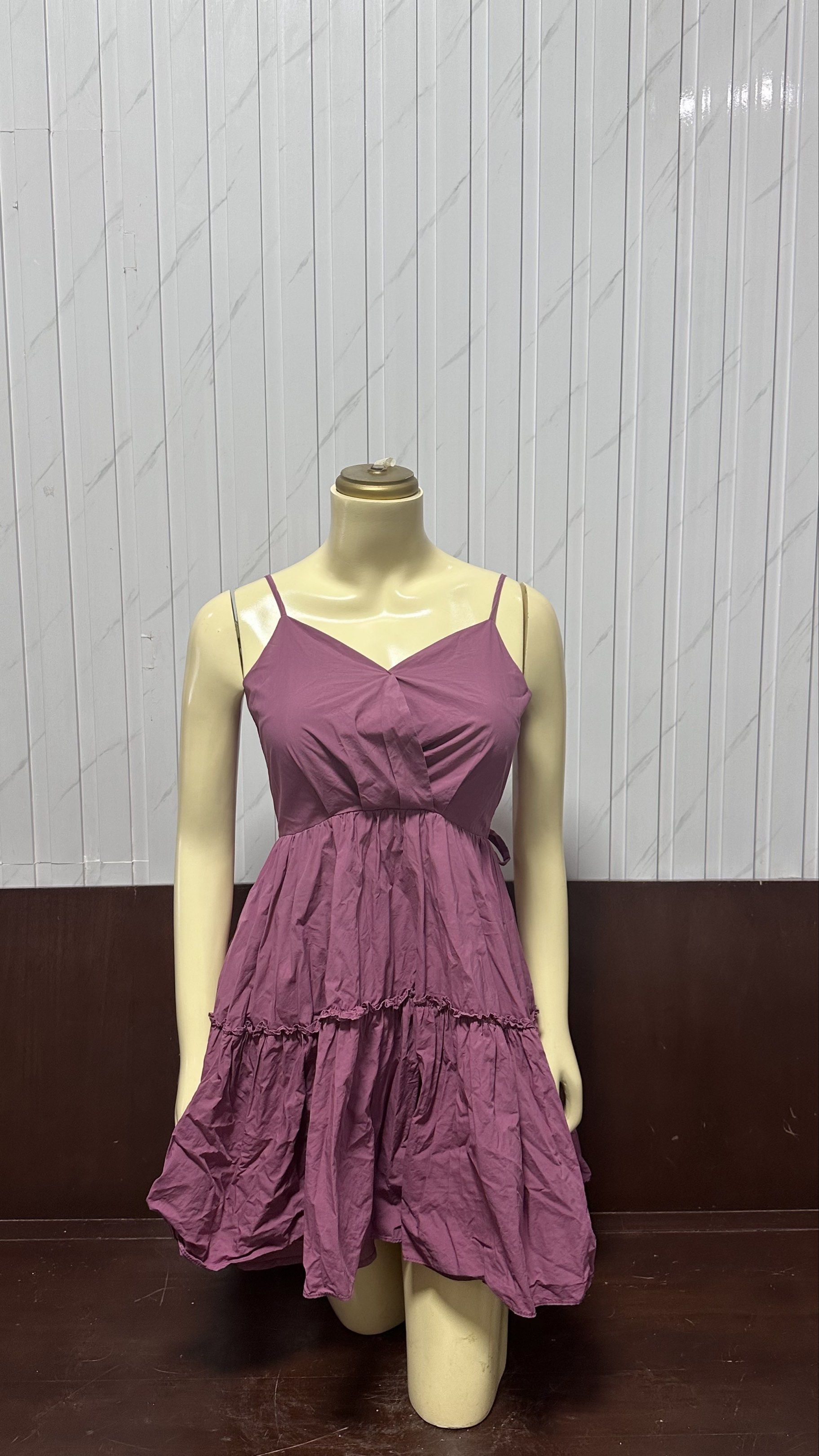 Purple Spaghetti Strap Dress (Category: Dresses) located in Taguig. Submitted by ylluhhhh (Listing ID 1419191852, Image 1). Description: - Muted purple dress - Flattering V-neck and spaghetti straps - Fitted bodice with tiered, flared skirt - Adjustable fit with back tie - Ideal for casual outings and summer events.