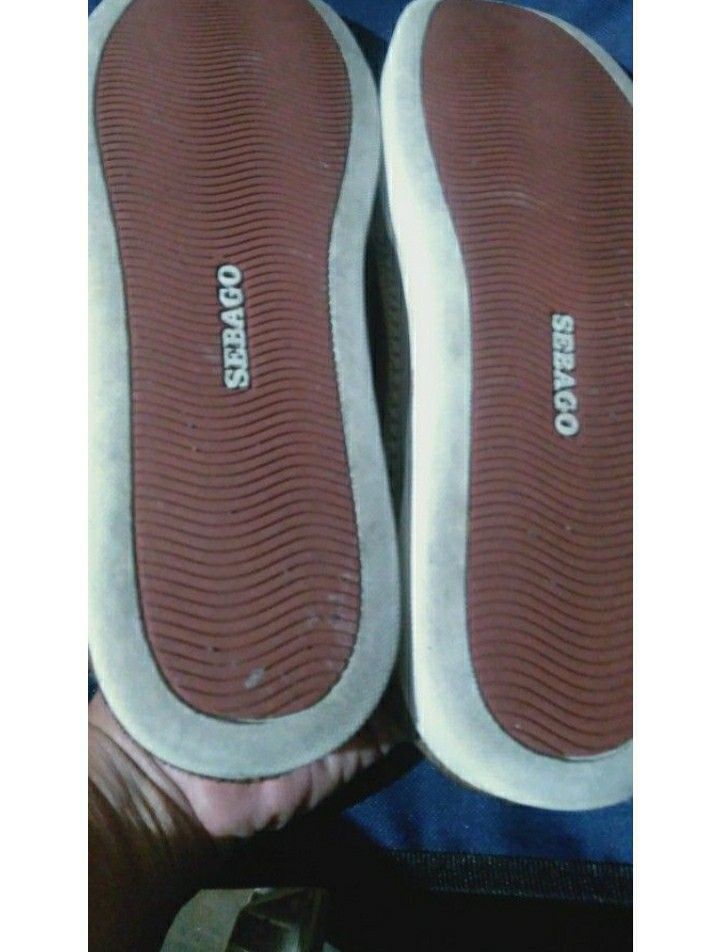 Sebago Boat Shoes (Category: Casual Shoes) located in Naga. Submitted by pec3c (Listing ID 1419086315, Image 3). Description: - Sebago boat shoes in brown leather - White soles with Sebago logo - Red soles - Leather laces - Metal eyelets - Sebago logo visible on the side - Well-maintained condition.