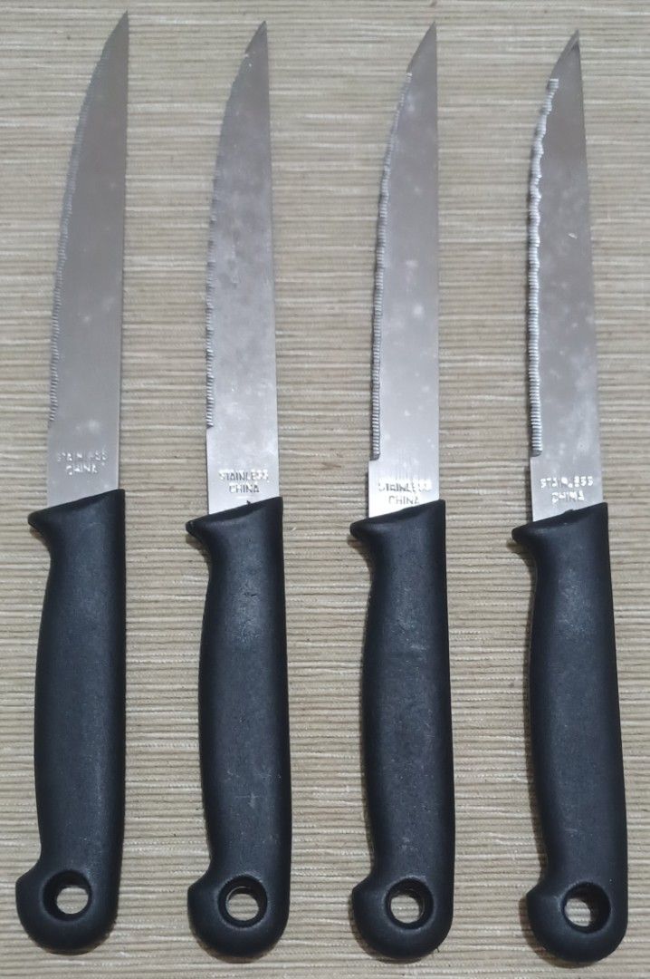 Set of 4 steak knives (Category: Knives & Chopping Boards) located in Quezon City. Submitted by wjmae (Listing ID 1418988507, Image 1). Description: - Set of 4 steak knives - Features black handles - Serrated blades for easy slicing - Perfect for everyday use.