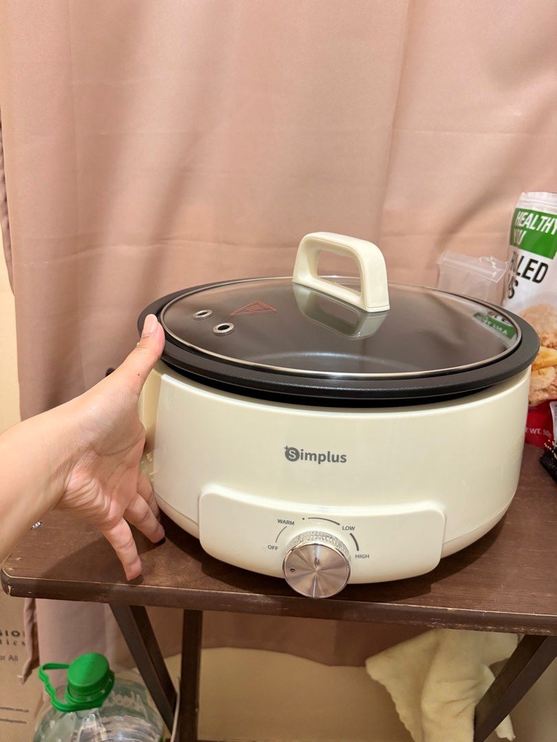 Simplus 4.2L Multi-function Electric Hot Pot (Category: Cookware & Accessories) located in Pasig City. Submitted by shopp.izzie (Listing ID 1419107187, Image 3). Description: Used once, super okay. Kakabili lang last week. RFS: Moving out. This is for dorm use sana kaso I changed my mind. - Simplus Electric Hot Pot - Color: Beige - Non-stick surface - Sunken and removable design for easy cleaning - Adjustable heat settings - Includes glass lid - 