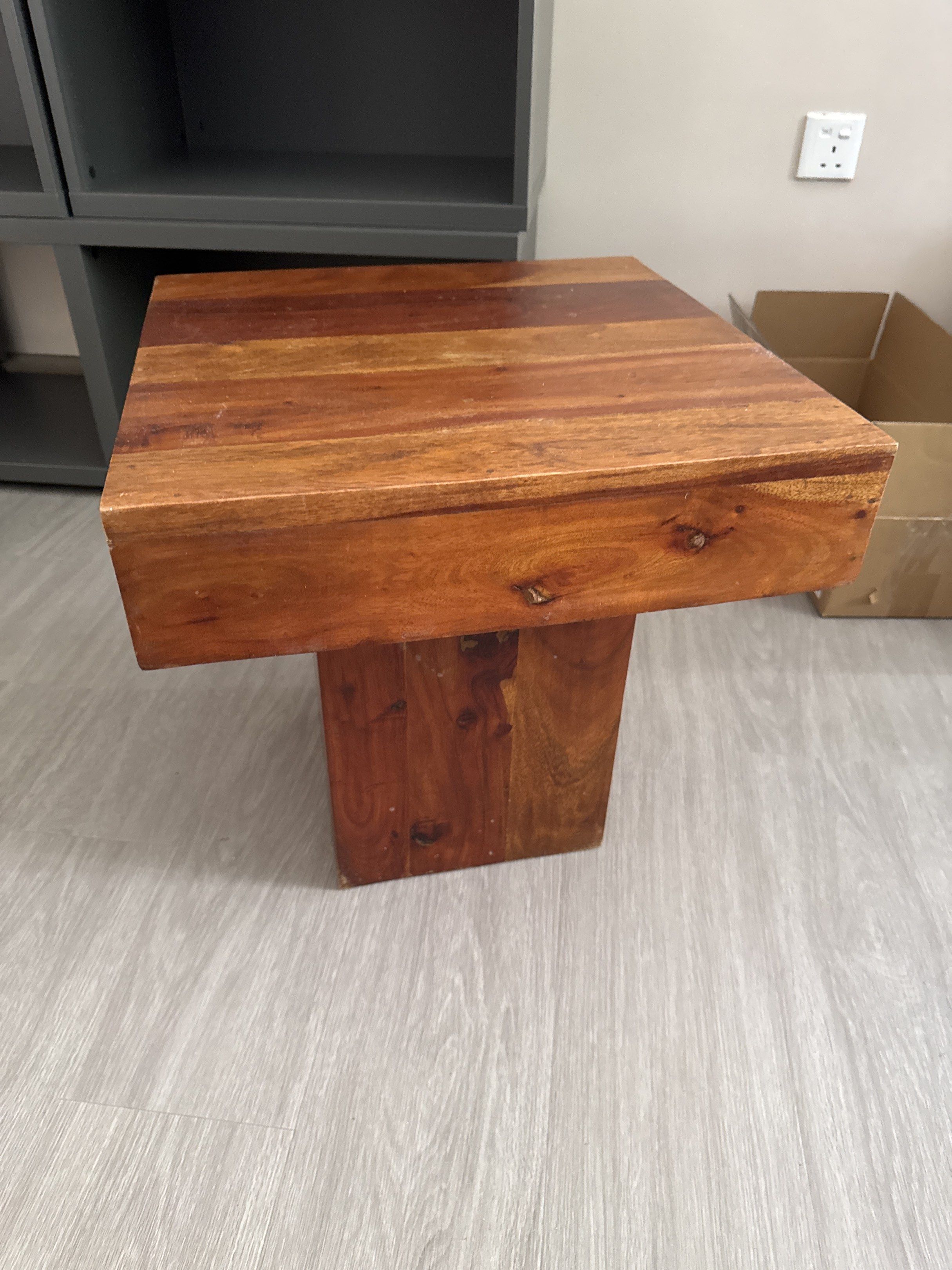 Solid Wood Side Table (Category: Tables & Sets) located in Singapore. Submitted by sunandrainbow (Listing ID 1419089021, Image 1). Description: - Solid wood side table - Perfect for living room or bedroom - Sturdy and well-maintained - Minor signs of use - Stylish and functional.