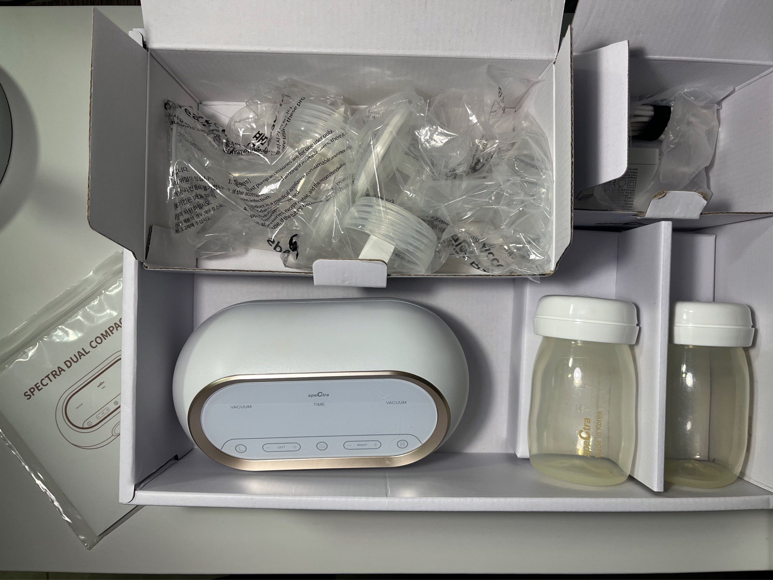 Spectra Dual Compact Breast Pump (Category: Breastfeeding & Bottle Feeding) located in Taytay. Submitted by bibidibabidiboo_1213 (Listing ID 1418993660, Image 3). Description: - Spectra Dual Compact Breast Pump - Premium electric breast pump - Compact and lightweight - Dual motors - Individual settings - Built-in battery - Timer function - Includes accessories - Modern design - SRP: Php 14,000 selling for only Php 9,000 price negotiable - Only us