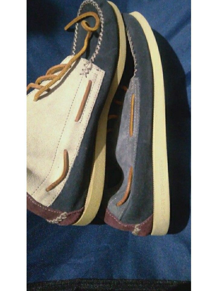 Sperry Top-Sider Boat Shoes (Category: Casual Shoes) located in Naga. Submitted by pec3c (Listing ID 1419087689, Image 3). Description: - Navy blue suede upper - Tan laces - Cream-colored, non-marking soles - Burgundy heel accent - Sperry logo on heel and insole - Well-maintained condition.