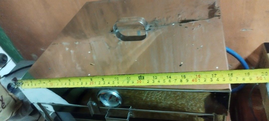 Stainless Steel Oven with Thermometer (Category: Ovens & Toasters) located in Manila. Submitted by edgarcabral (Listing ID 1419049459, Image 3). Description: - Stainless steel oven - Built-in thermometer - Top handle - Bottom control knob - Includes two internal racks - Approximately 20" wide and 20" tall - In good working condition.