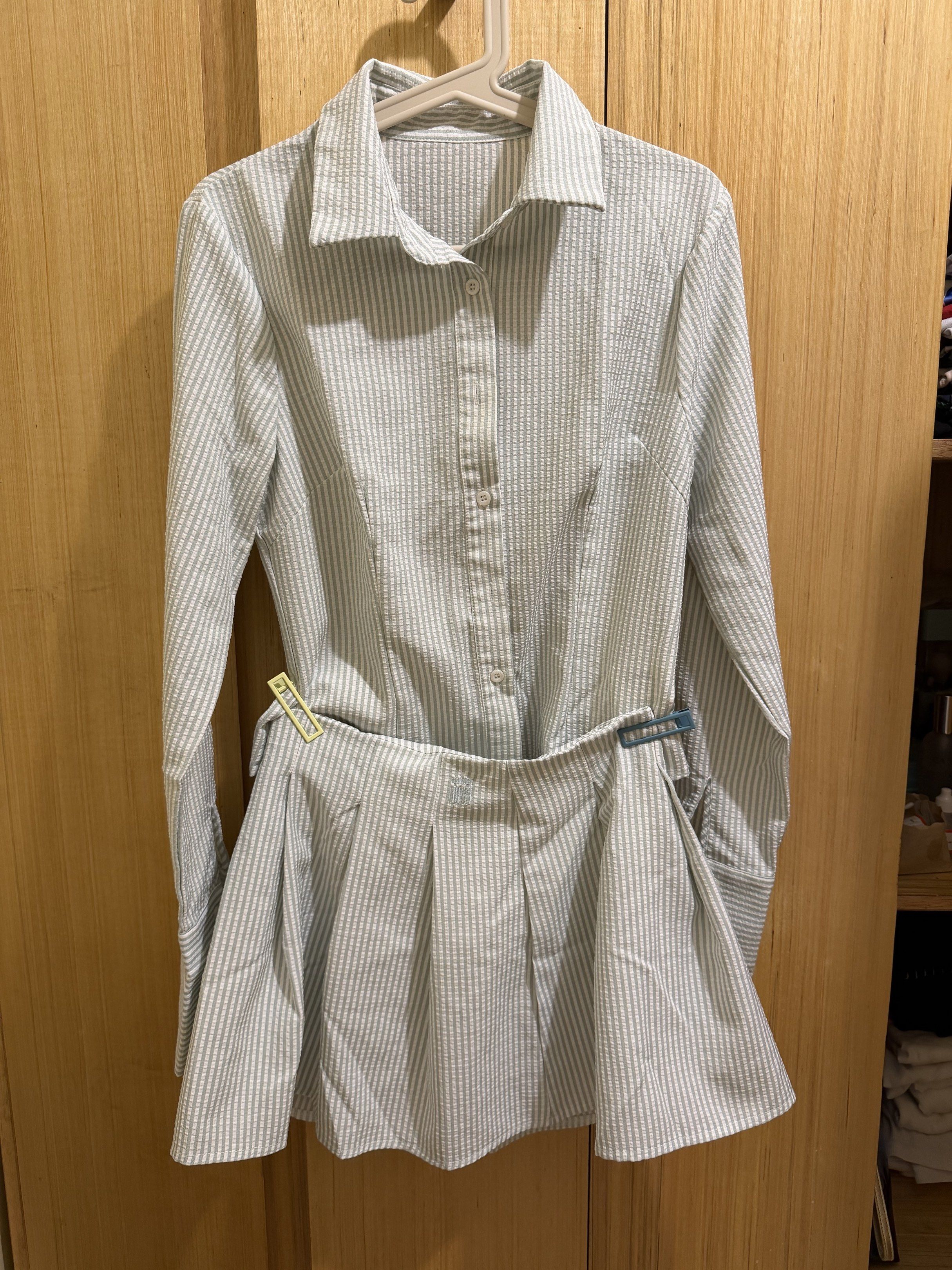 Striped Shirt and Skirt Set (Category: Sets or Coordinates) located in Taguig. Submitted by kcmple (Listing ID 1419140936, Image 1). Description: - Matching collared, long-sleeved shirt and pleated skirt set - Features a vertical striped pattern - Shirt has a button-down closure - Skirt with a fitted waistband - Light color with green stripes.