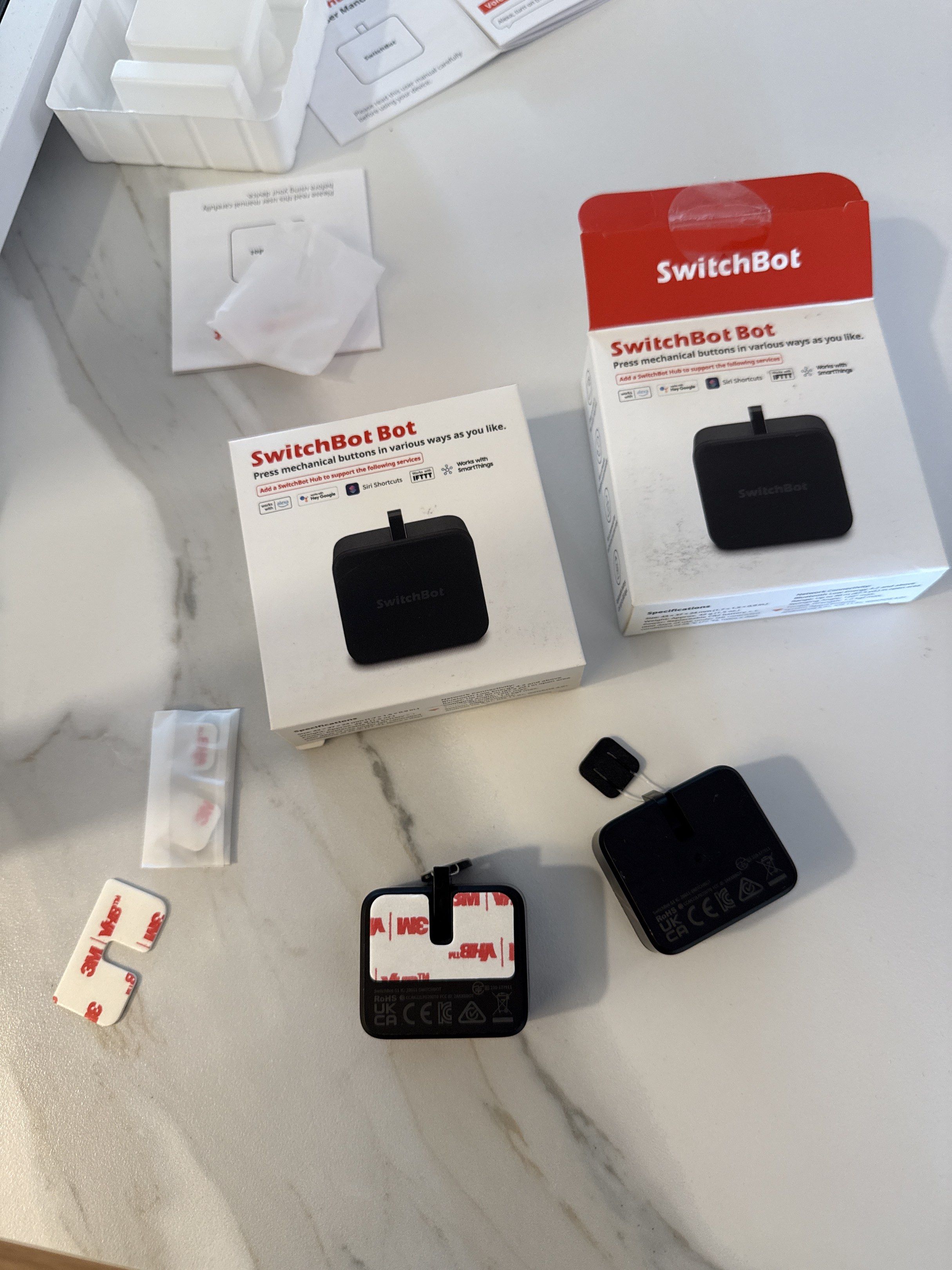 SwitchBot Bot - Smart Button Pusher (Category: Entertainment Systems & Smart Home Devices) located in Singapore. Submitted by b__enjamin (Listing ID 1419087172, Image 1). Description: Incompatible with my house switches, selling at $60 for both U.P $39/pc - Brand new SwitchBot Bot - Automates existing appliances - Easy to install and use - Includes all original packaging - Comes with adhesive pads - Perfect for smart home setups.