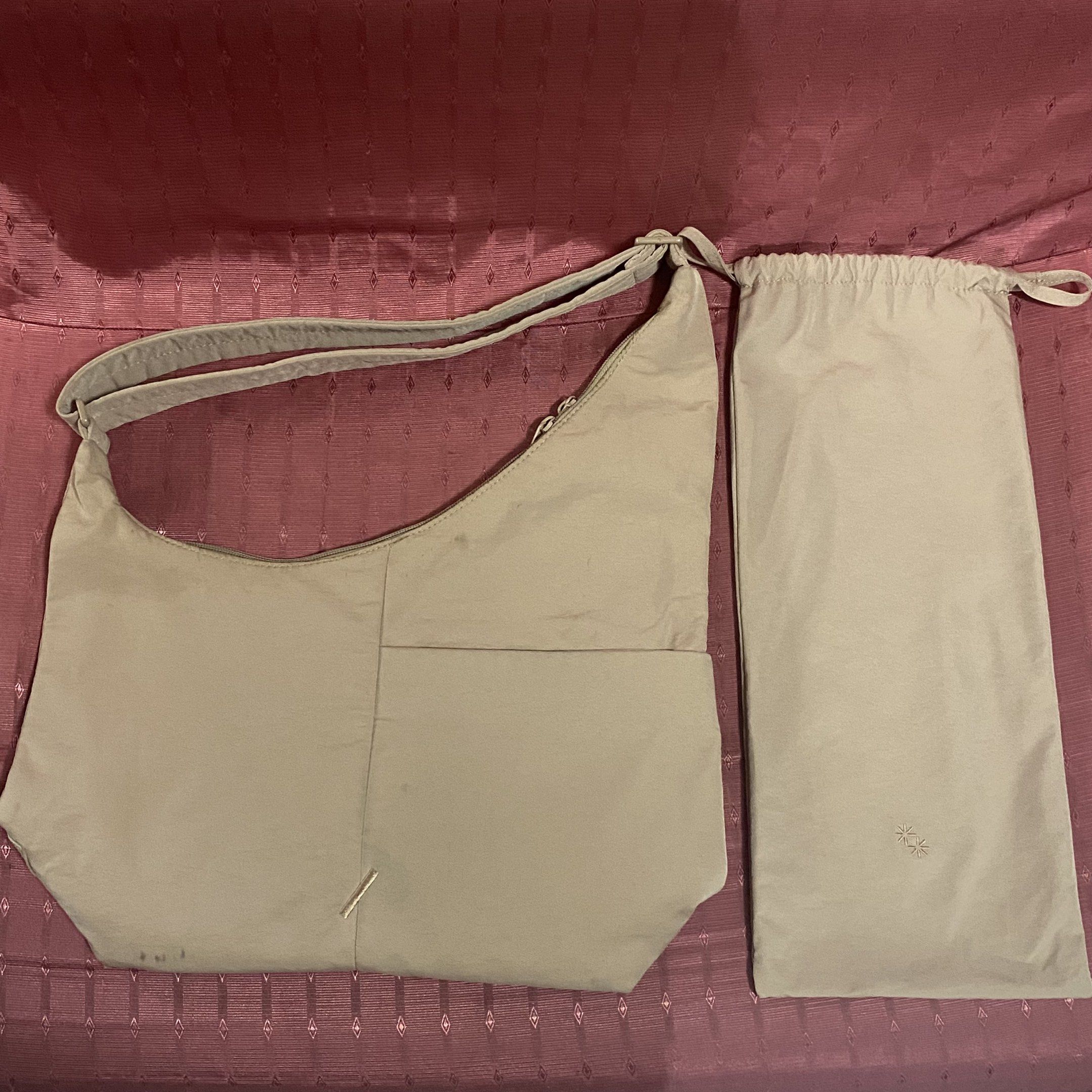 The Paper Bunny Midi Arc (Clay) (Category: Luxury Bags & Wallets) located in Binan City. Submitted by _jennilynred (Listing ID 1419044459, Image 1). Description: Bought from The Paper Bunny SG Issues: Lost the key strap that comes in it See photos of visible stains in the bag Last price posted RFS: Decluttering .