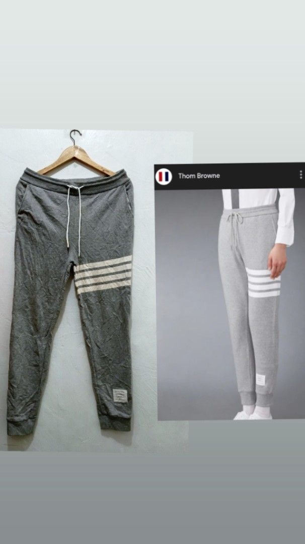 Thom Browne CLASSIC loopback 4bar trackpants (Category: Luxury Apparel) located in Manila. Submitted by eriiicaspage (Listing ID 1419159323, Image 1). Description: PreOwned Lightly Used Authentic THOM BROWNE. Classic loopback 4bar trackpamts -Size 1 fits MENS -SMALL -MEDIUM WOMENS -LARGE -XL - White stripes on left leg - Drawstring waist - Small patch detail - Soft material - Small detail on back waistband Made in Japan Min Sign of Used flaws : N