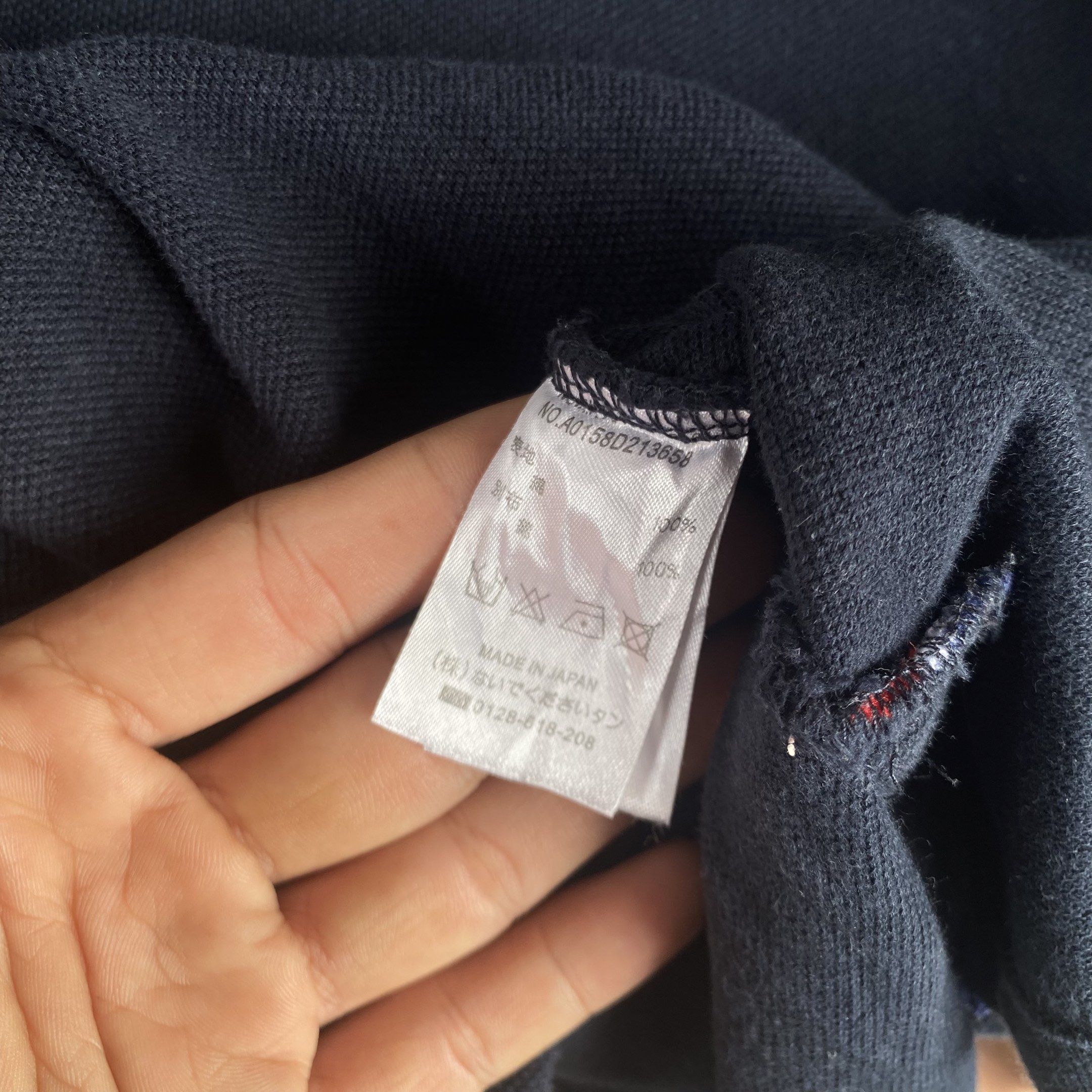Thom Browne Navy T-shirt with Stripes (Category: Luxury Apparel) located in Manila. Submitted by d____g (Listing ID 1419002861, Image 3). Description: Thone Browne Size:2 W:19 L:27 No issue.