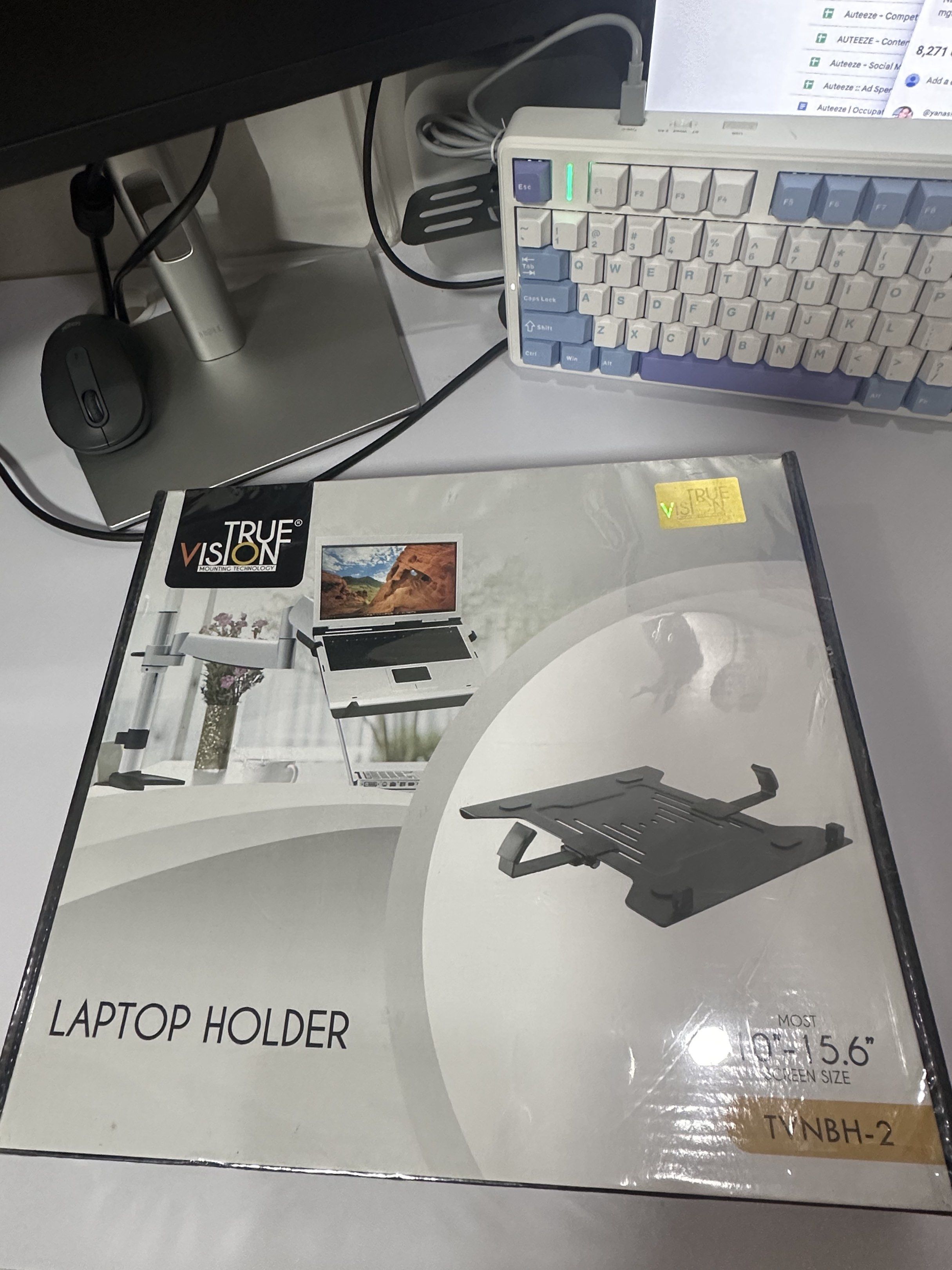 True Vision Laptop Holder (Category: Mounts & Holders) located in Taguig. Submitted by ylluhhhh (Listing ID 1419189866, Image 1). Description: - True Vision Laptop Holder - Fits most 10-15.6 inch screens - Modern and sleek design.