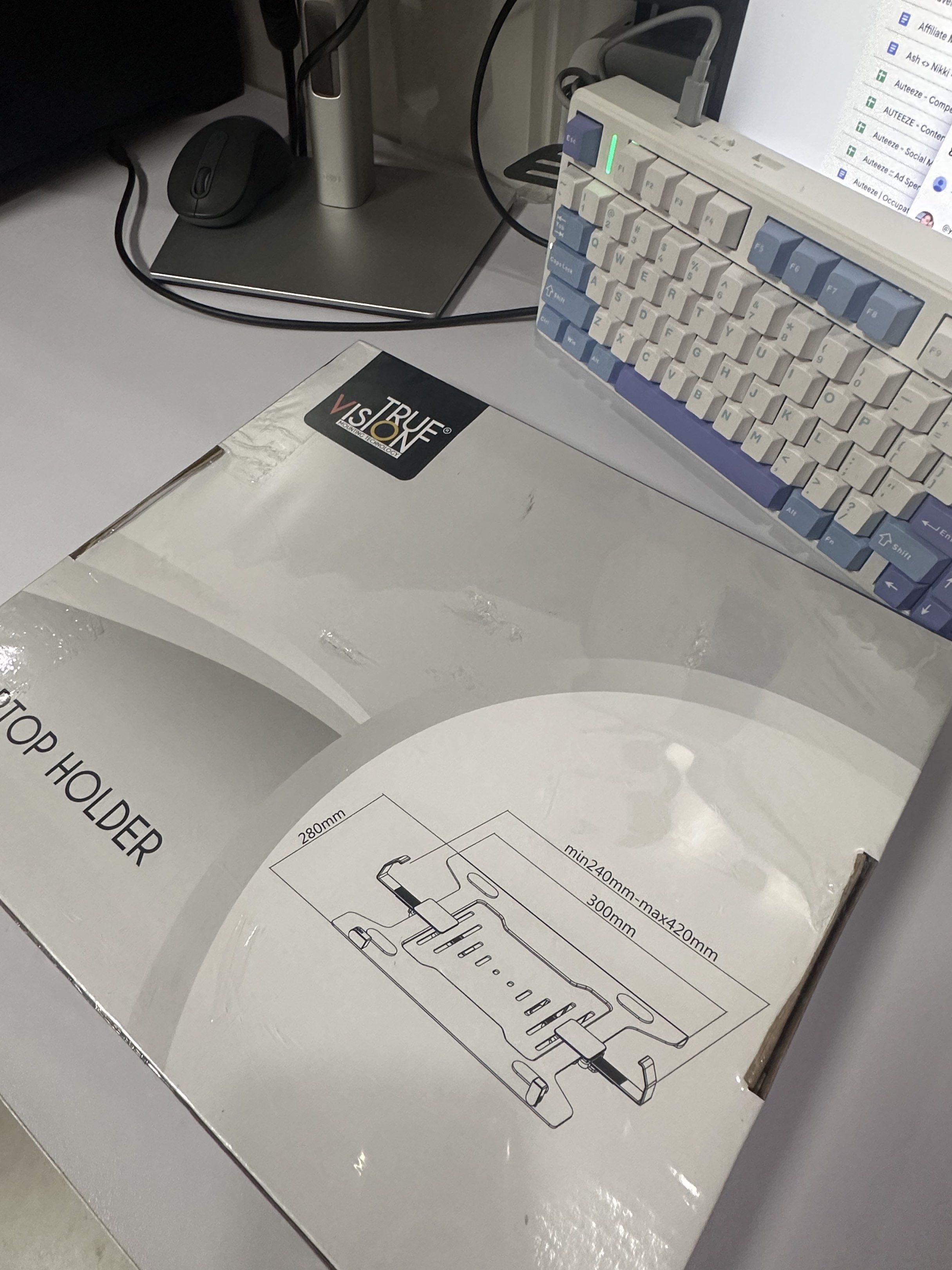 True Vision Laptop Holder (Category: Mounts & Holders) located in Taguig. Submitted by ylluhhhh (Listing ID 1419189866, Image 3). Description: - True Vision Laptop Holder - Fits most 10-15.6 inch screens - Modern and sleek design.