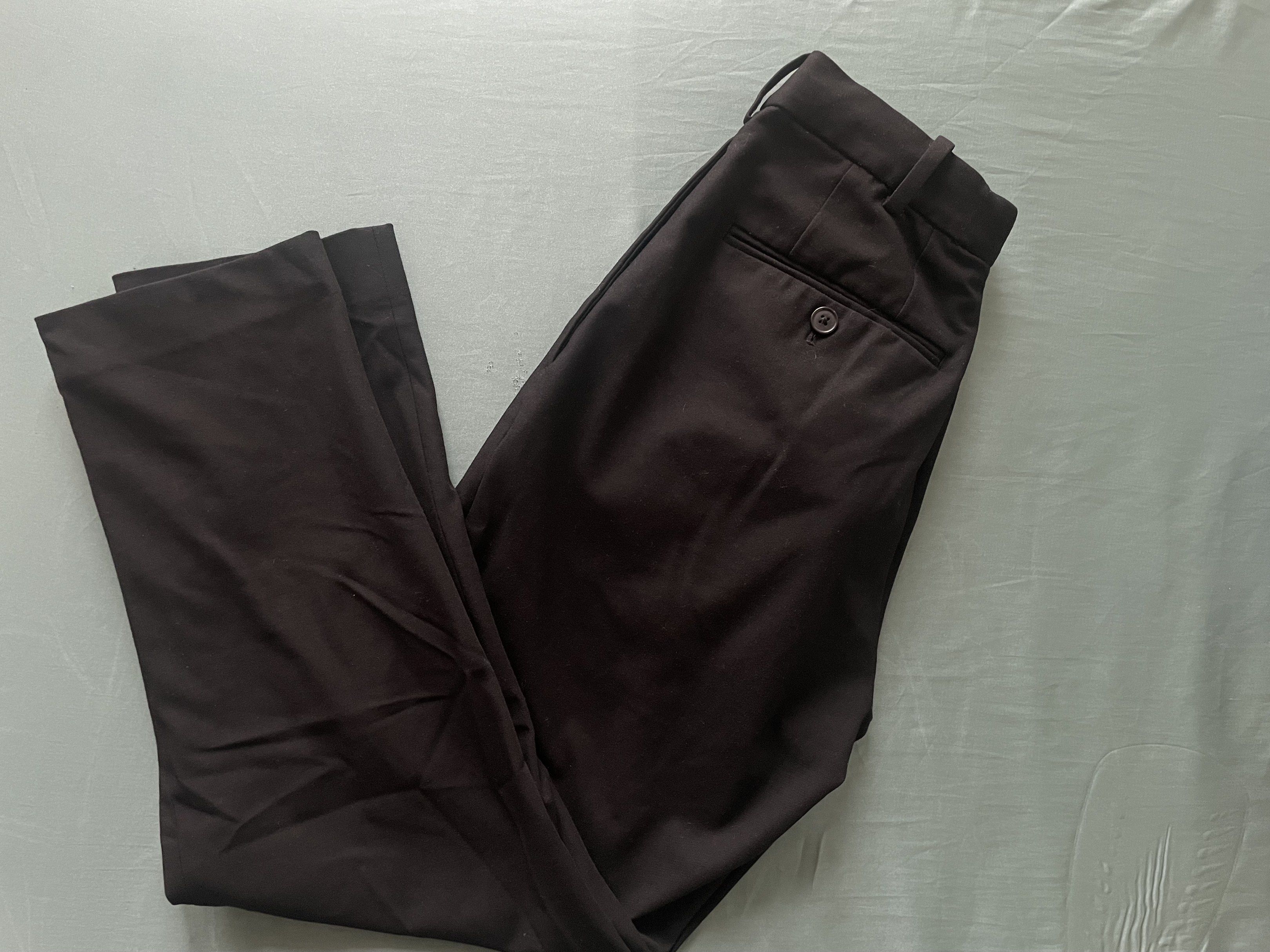 Uniqlo Black Pants - Size S (Category: Other Bottoms) located in Manila. Submitted by circiel (Listing ID 1419154614, Image 2). Description: - Uniqlo Black Pants - Size: S (Waist: 68-76cm) - Material: Polyester, Rayon, Spandex, Cotton blend - Features: Button closure, classic design - Great for everyday wear or dressing up.